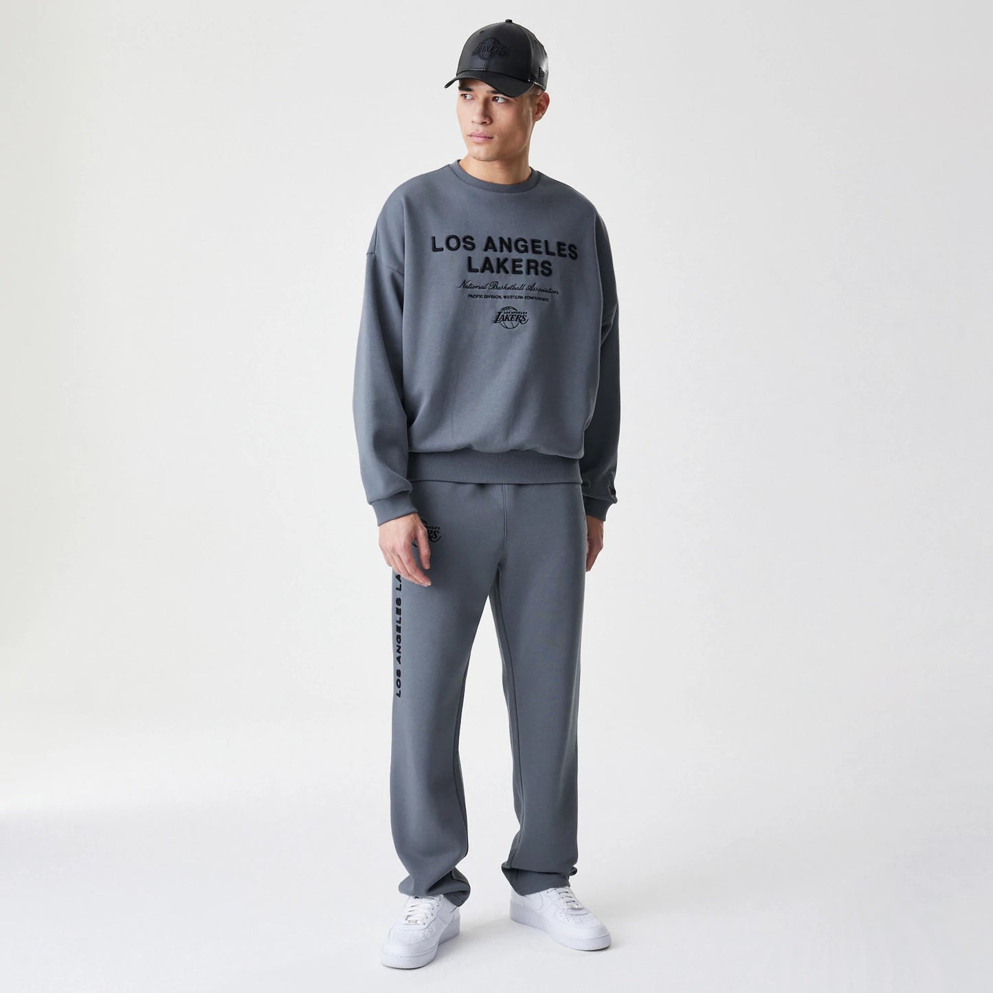 The Male model is wearing LA Lakers NBA Linear Dark Grey Crew Neck Sweater 8