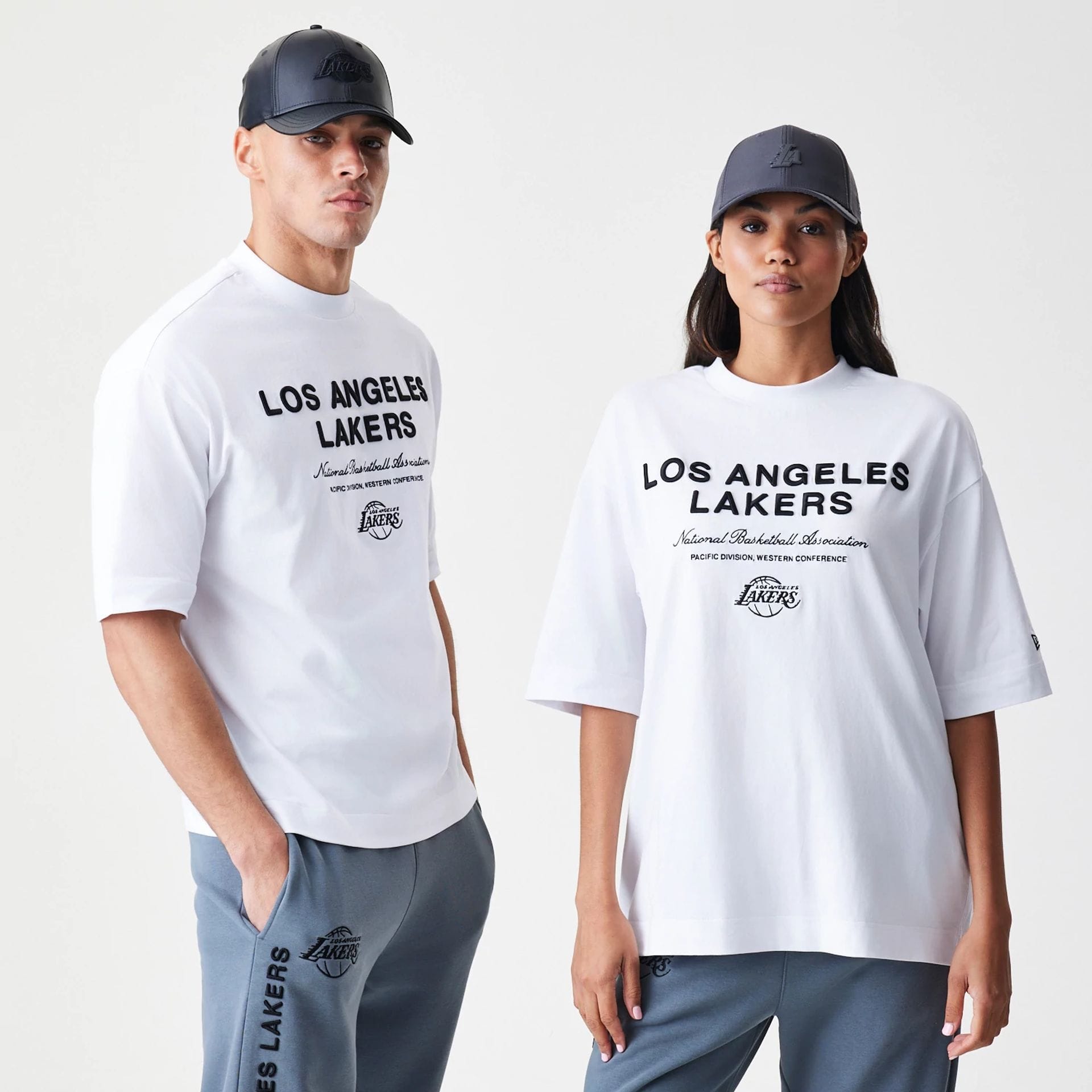 The Male model is wearing LA Lakers NBA Linear White T-Shirt 1