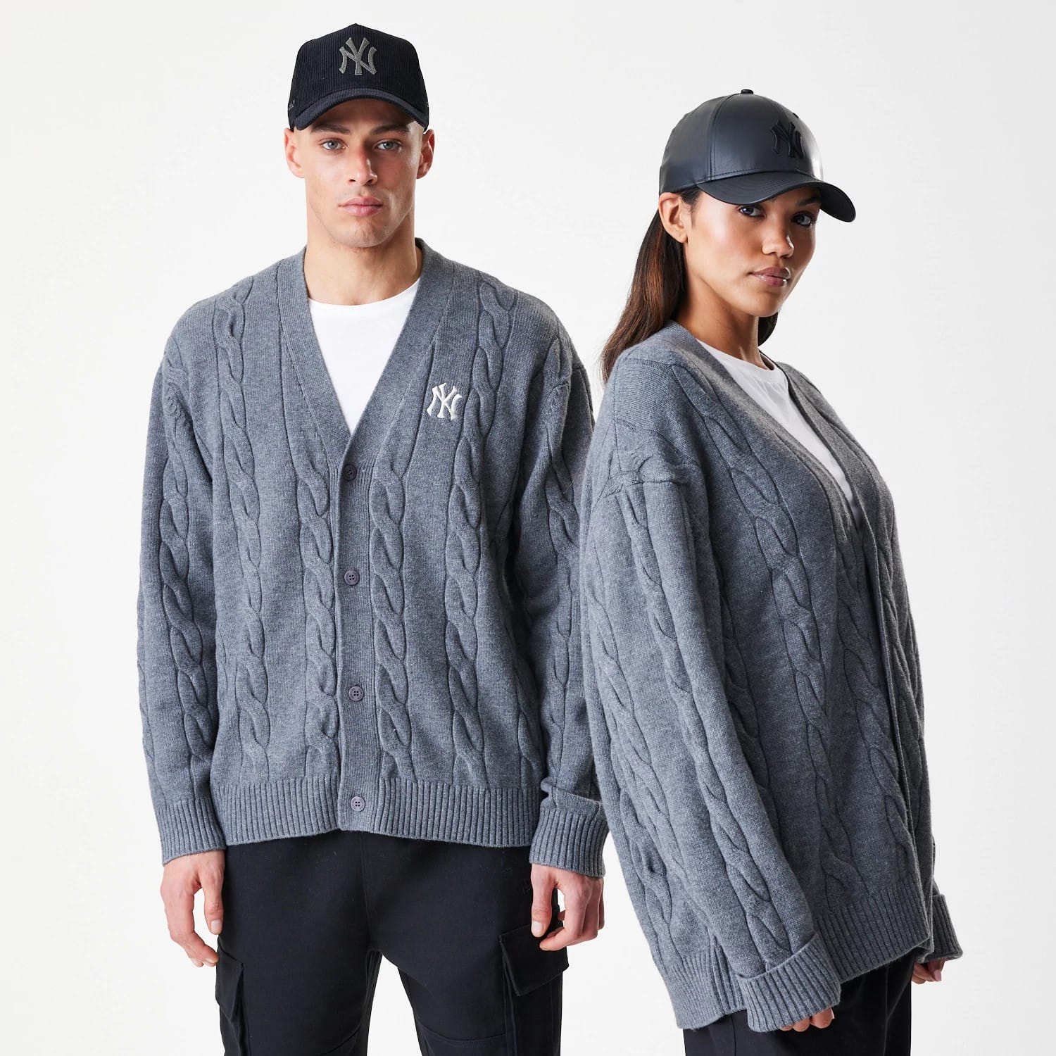 The Male model is wearing New York Yankees MLB Cable Knit Dark Grey Cardigan 1