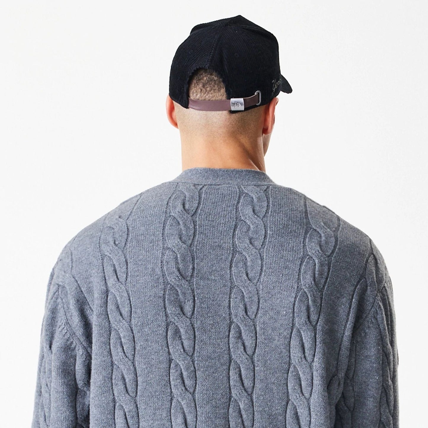 The Male model is wearing New York Yankees MLB Cable Knit Dark Grey Cardigan 8