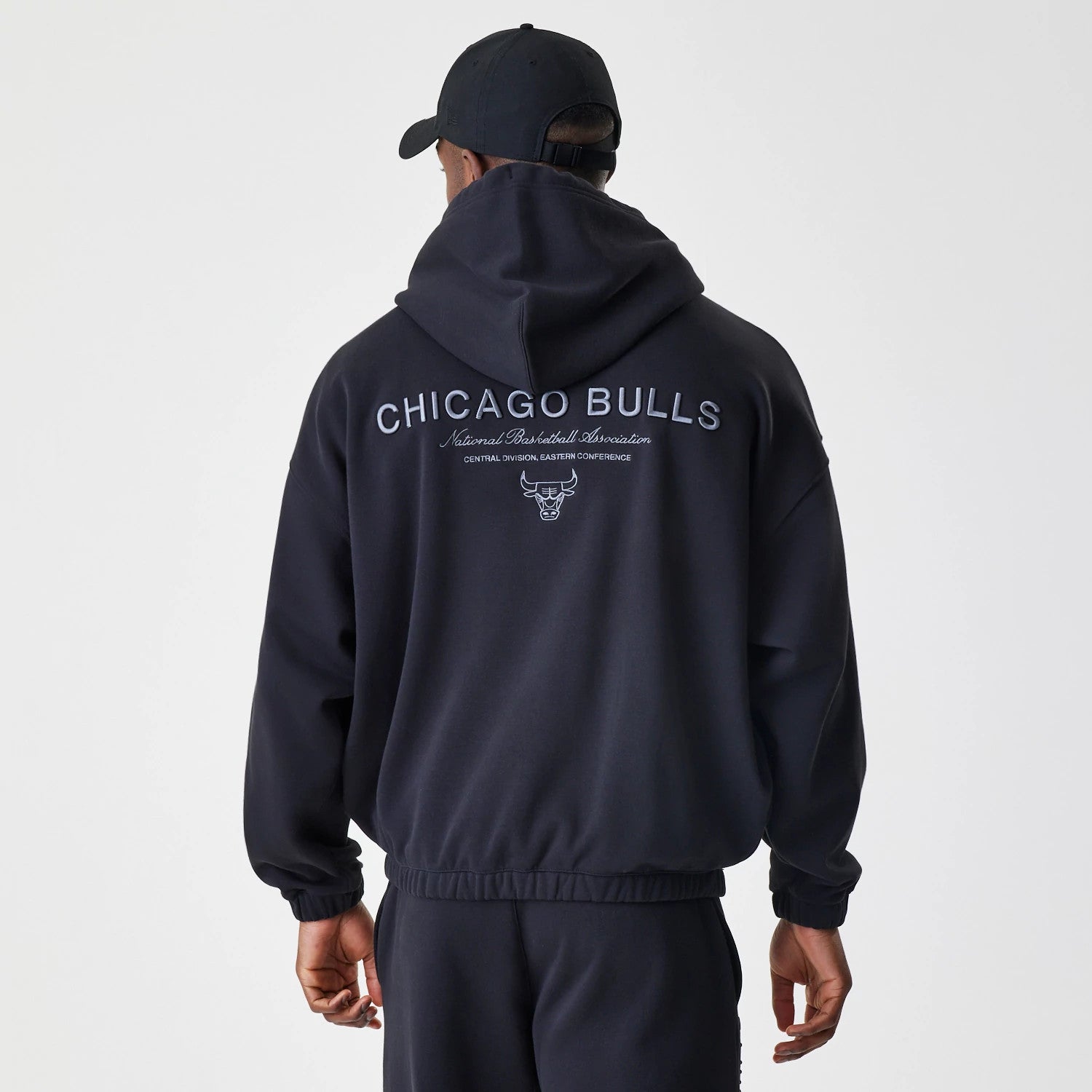 The Male model is wearing Chicago Bulls NBA Linear Black Oversized Full Zip Hoodie 2