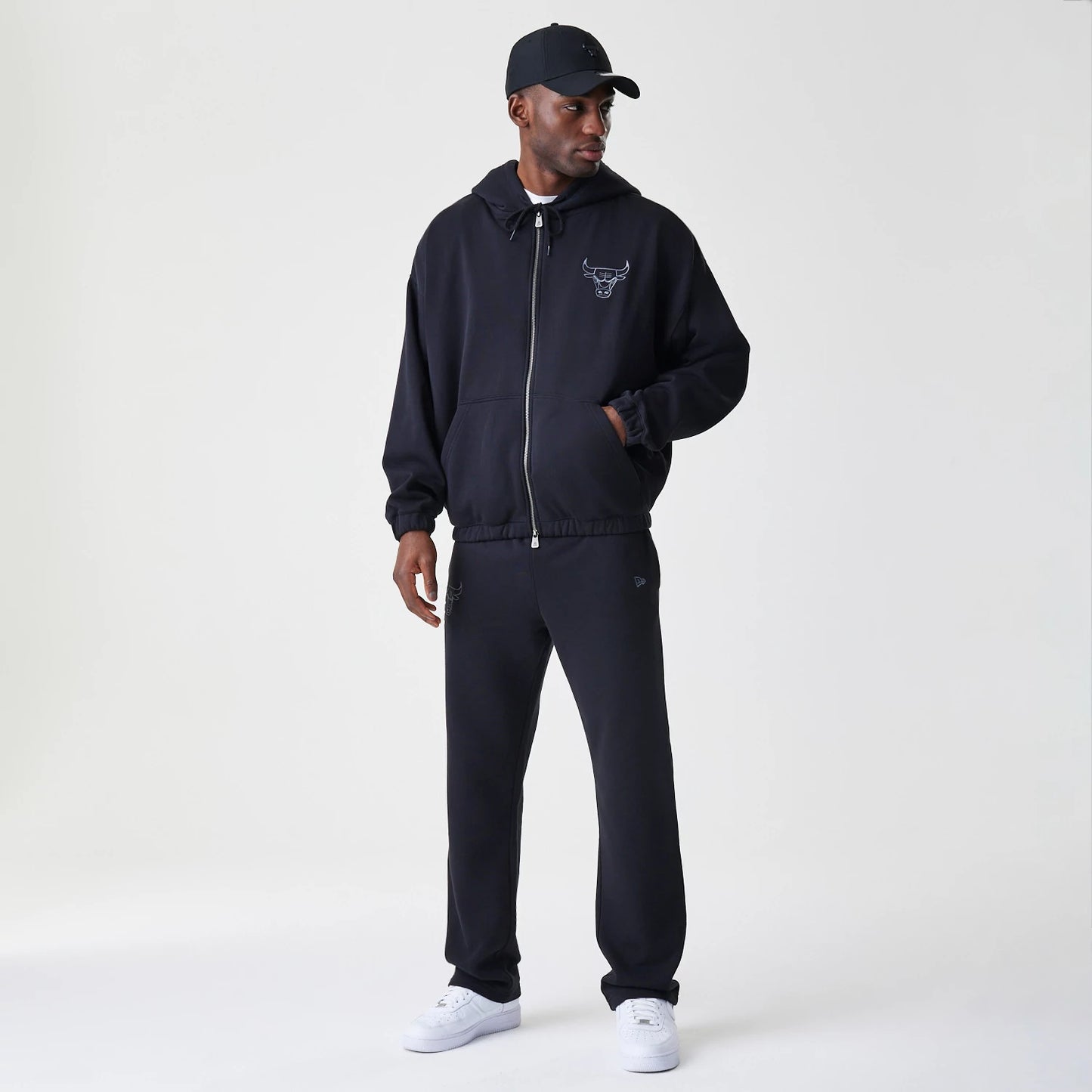 The Male model is wearing Chicago Bulls NBA Linear Black Oversized Full Zip Hoodie 8
