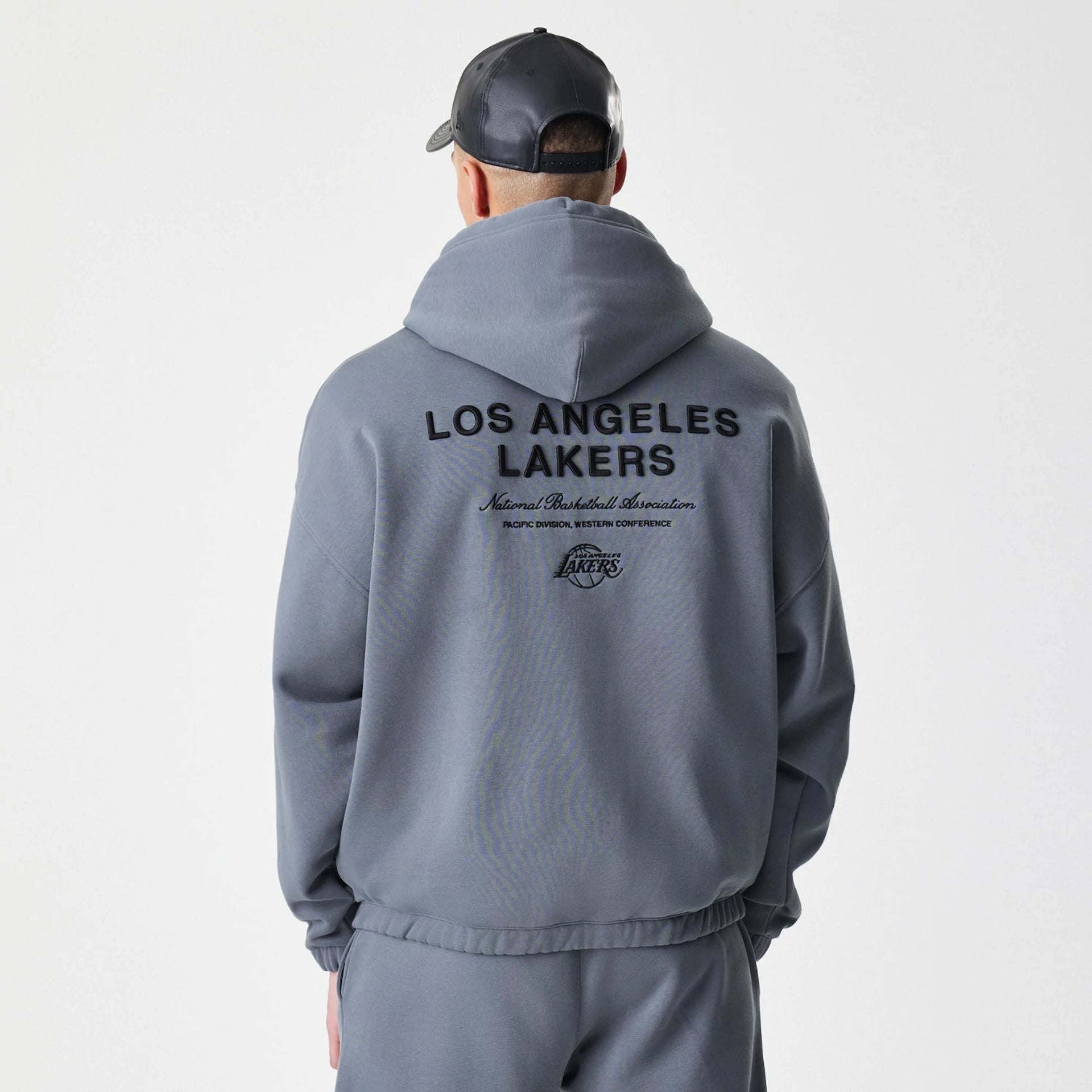 The Male model is wearing LA Lakers NBA Linear Dark Grey Oversized Full Zip Hoodie 2