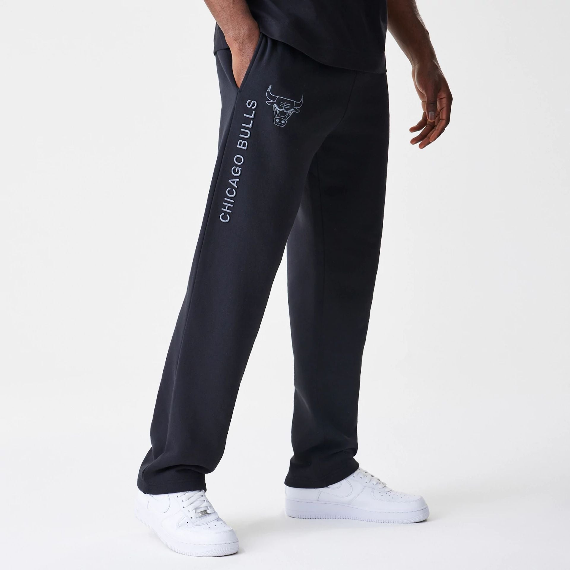 The Male model is wearing Chicago Bulls NBA Linear Black Straight Leg Joggers 1