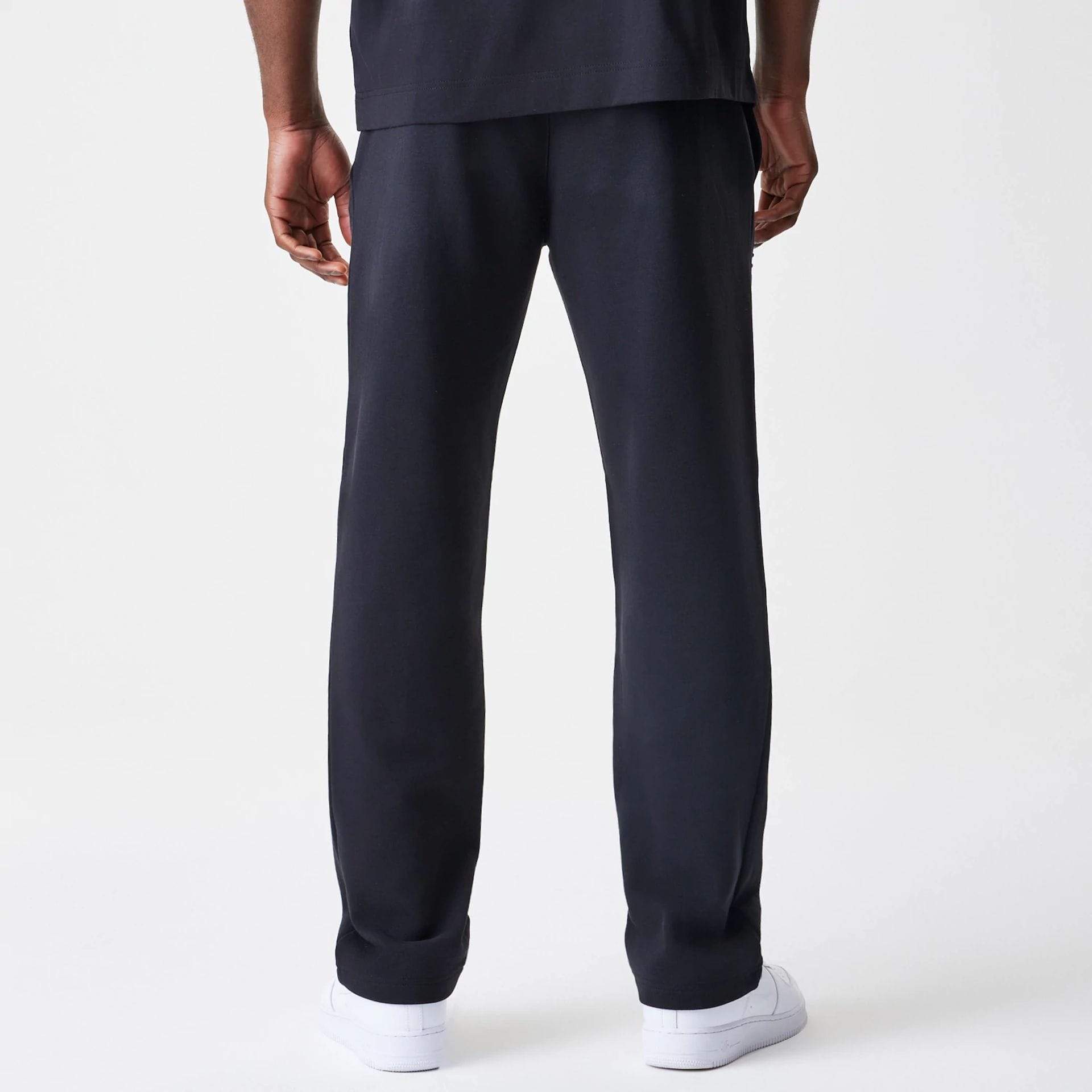 The Male model is wearing Chicago Bulls NBA Linear Black Straight Leg Joggers 2