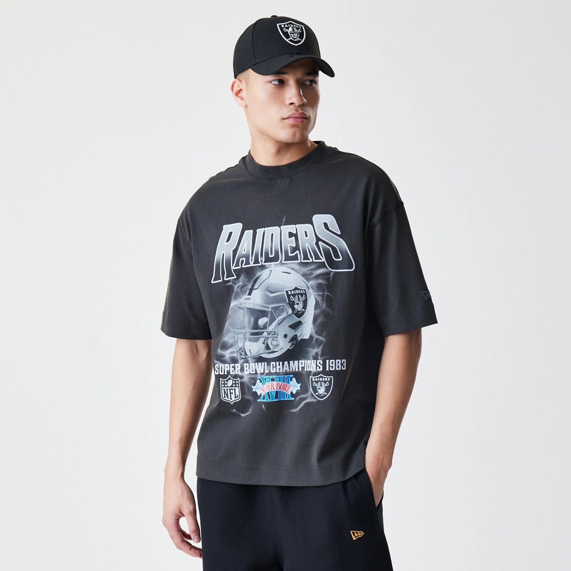 The Male model is wearing Las Vegas Raiders NFL Washed Boxy Dark Grey Oversized T-Shirt 1