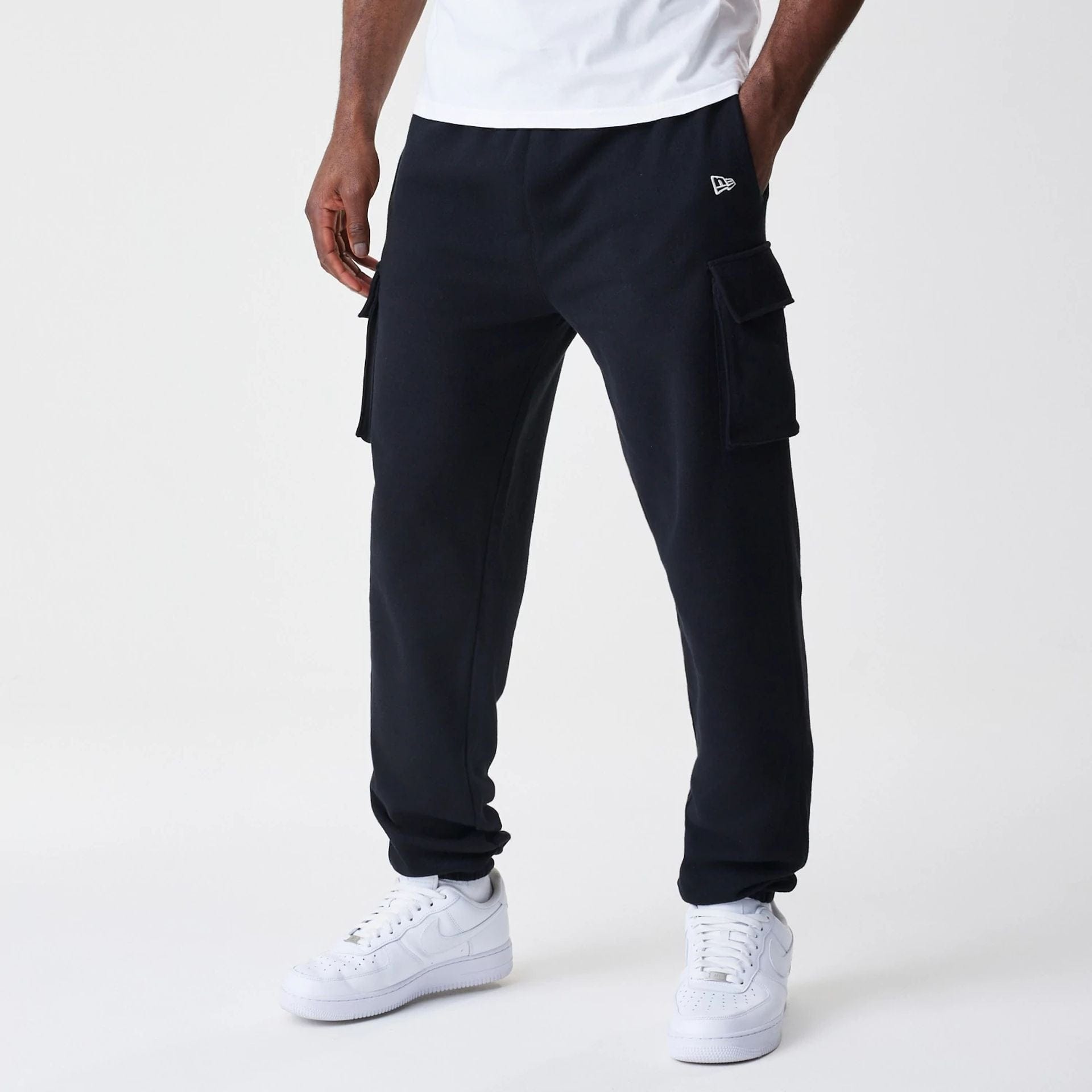 The Male model is wearing New Era Cargo Black Joggers 1