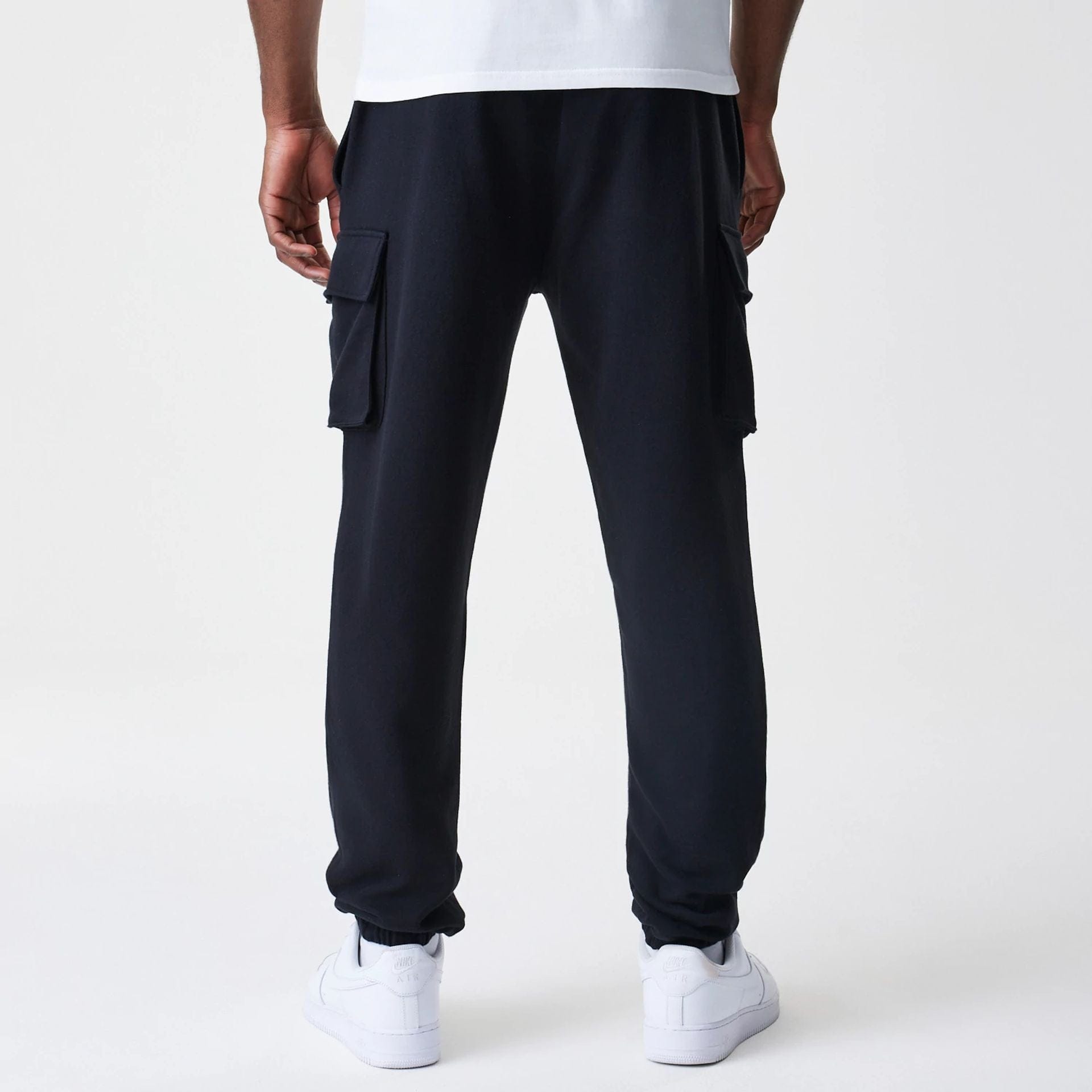 The Male model is wearing New Era Cargo Black Joggers 2