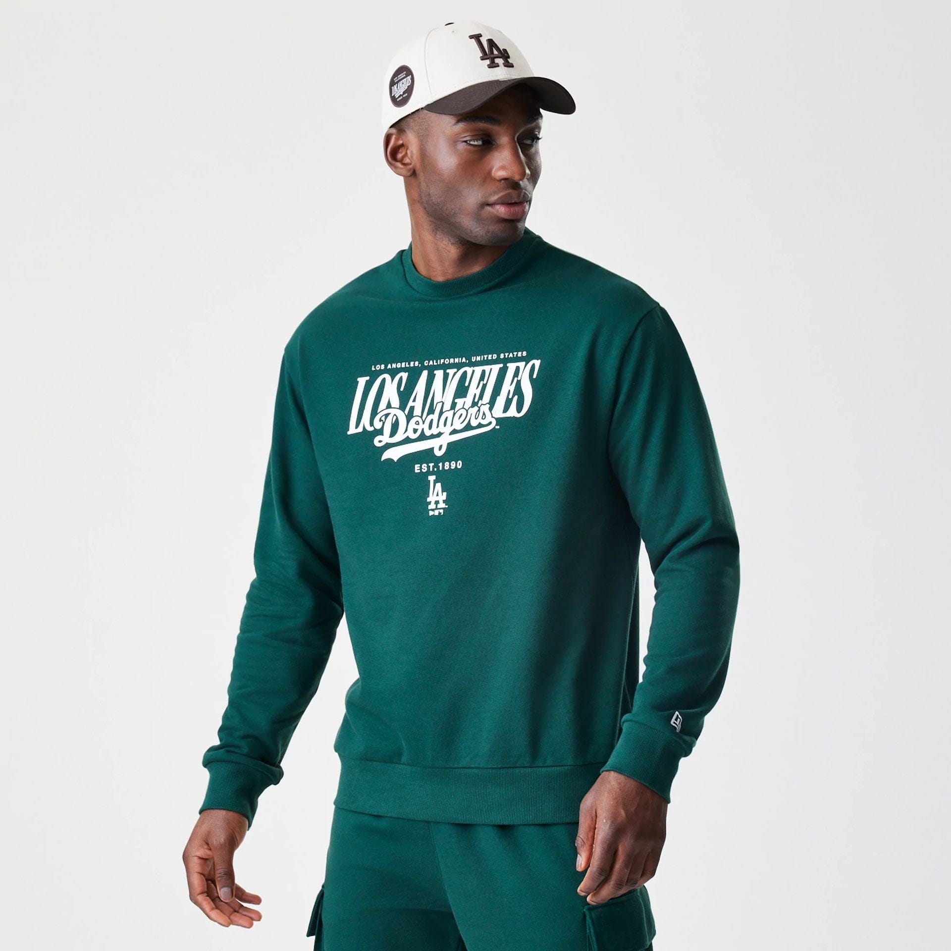 The Male model is wearing LA Dodgers MLB Script Dark Green Crew Neck Sweater 1