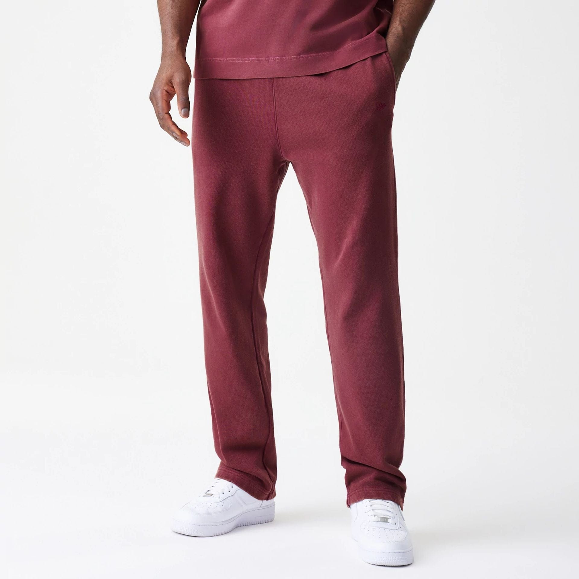 The Male model is wearing New Era Washed Dark Red Straight Leg Joggers 1