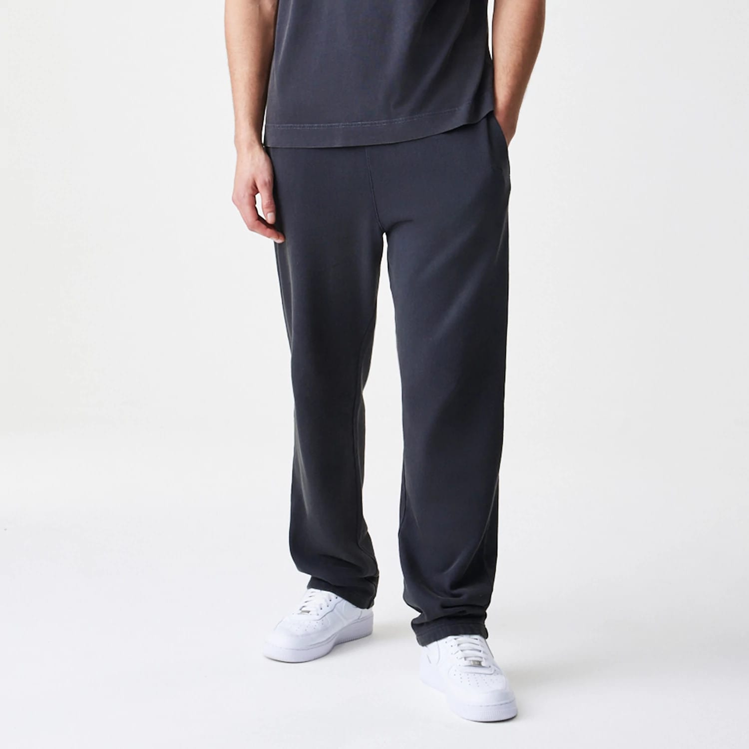 The Male model is wearing New Era Washed Black Straight Leg Joggers 3