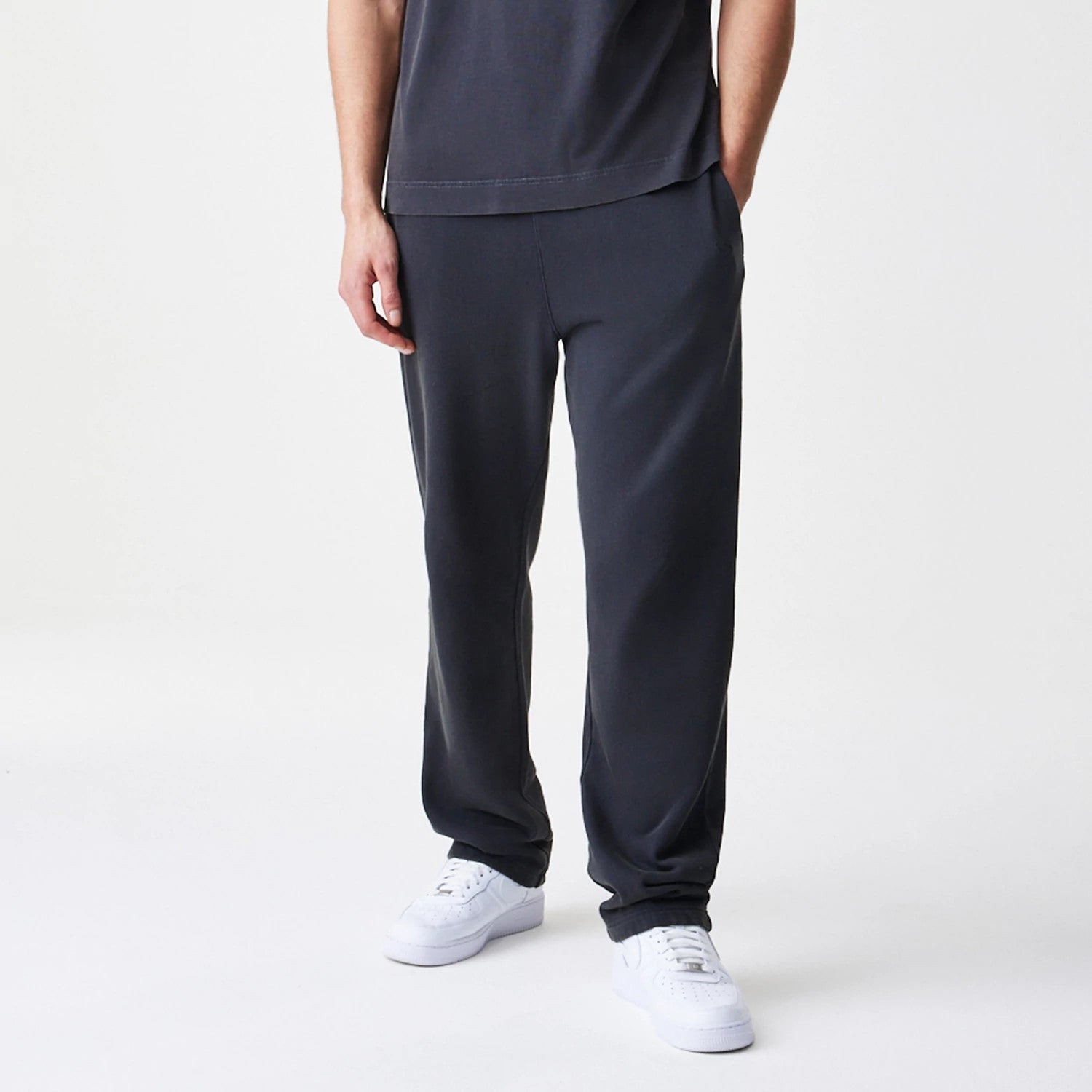 The Male model is wearing New Era Washed Black Straight Leg Joggers 3