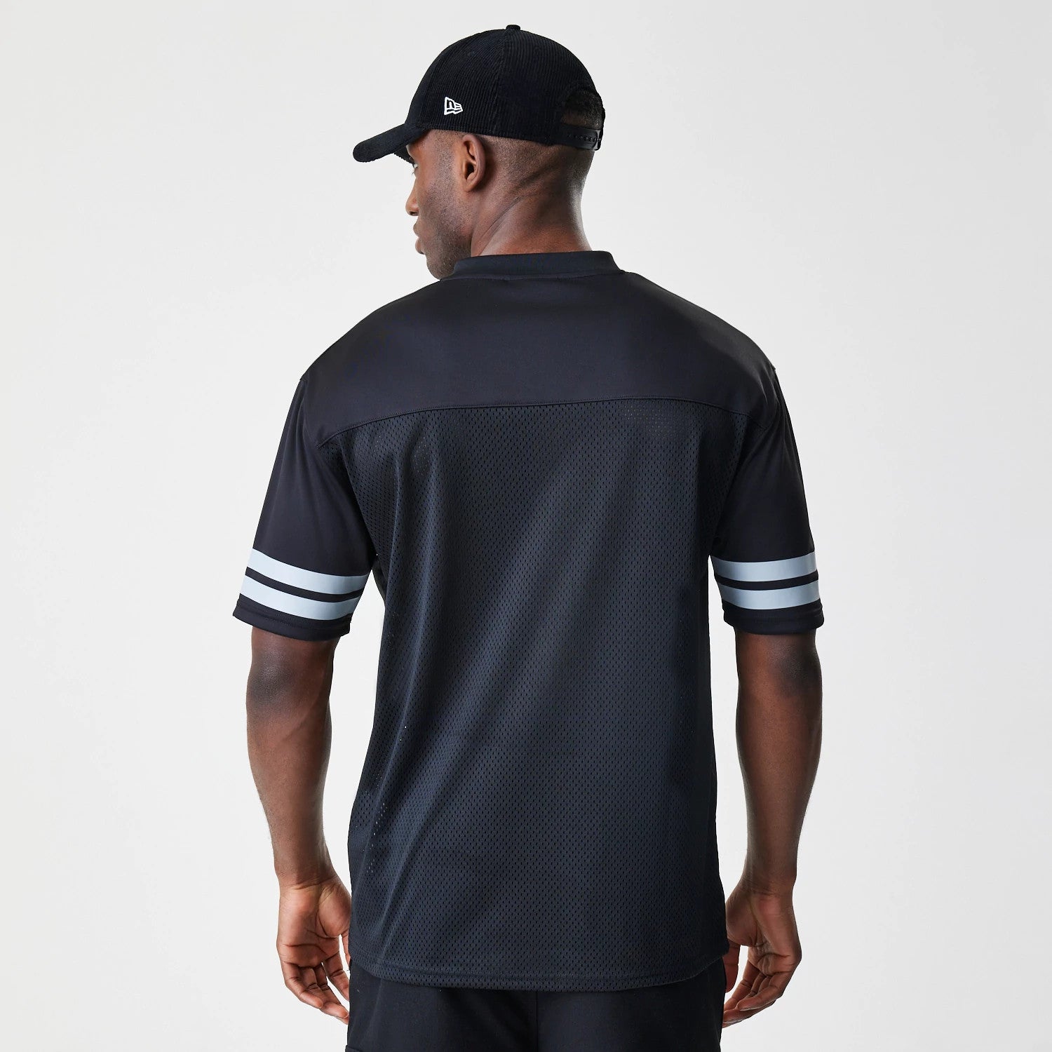 The Male model is wearing Las Vegas Raiders Script NFL Mesh Black Jersey 2