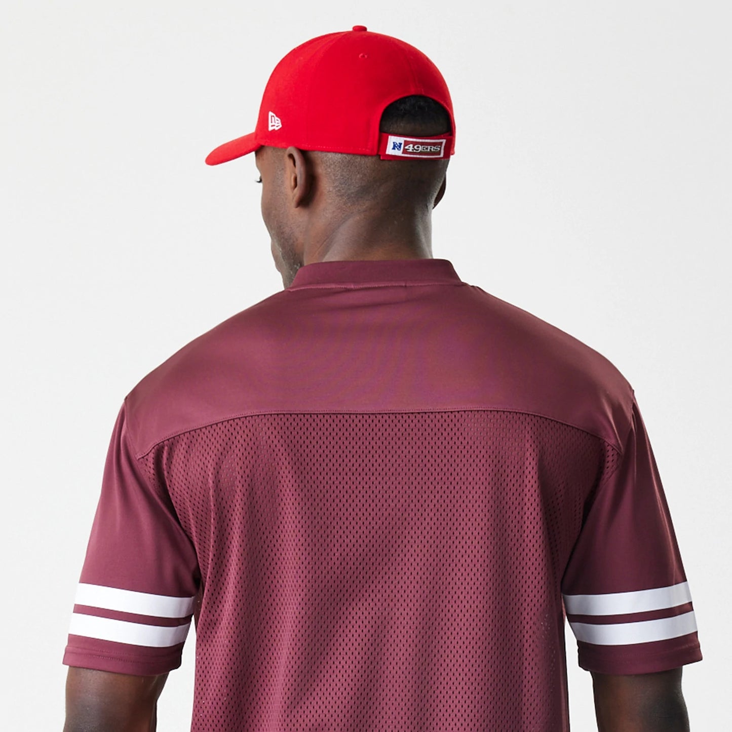 The Male model is wearing San Francisco 49ers NFL Mesh Dark Red Jersey 8