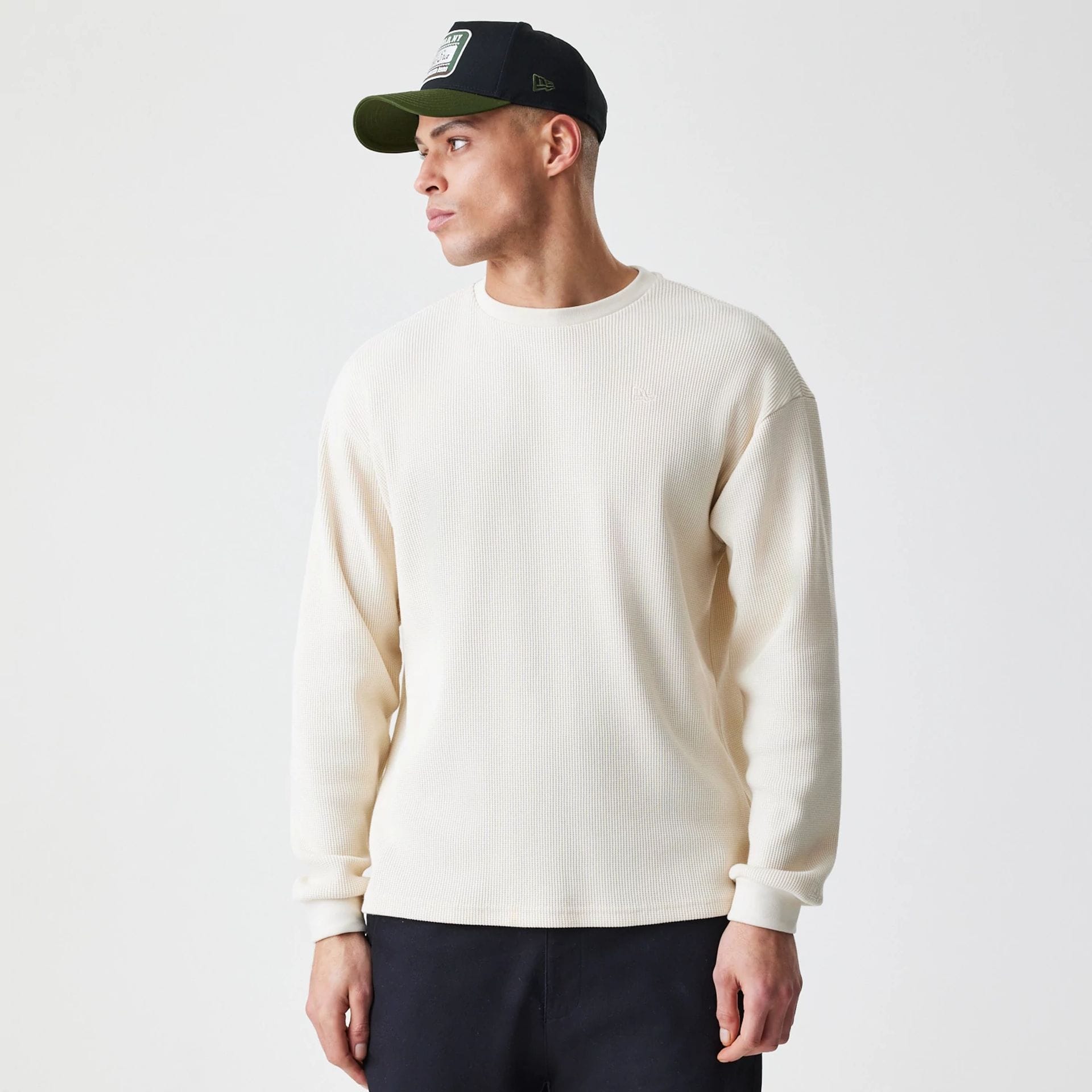 The Male model is wearing New Era Waffle Light Beige Long Sleeve T-Shirt 1