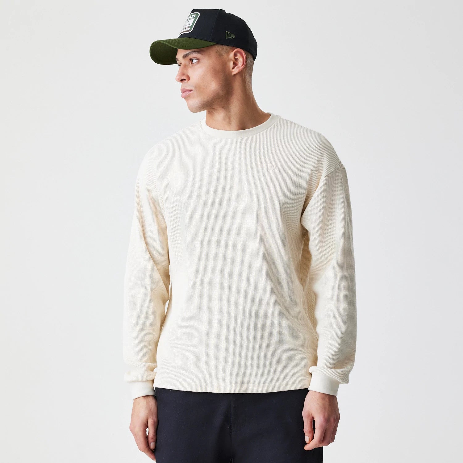 The Male model is wearing New Era Waffle Light Beige Long Sleeve T-Shirt 1