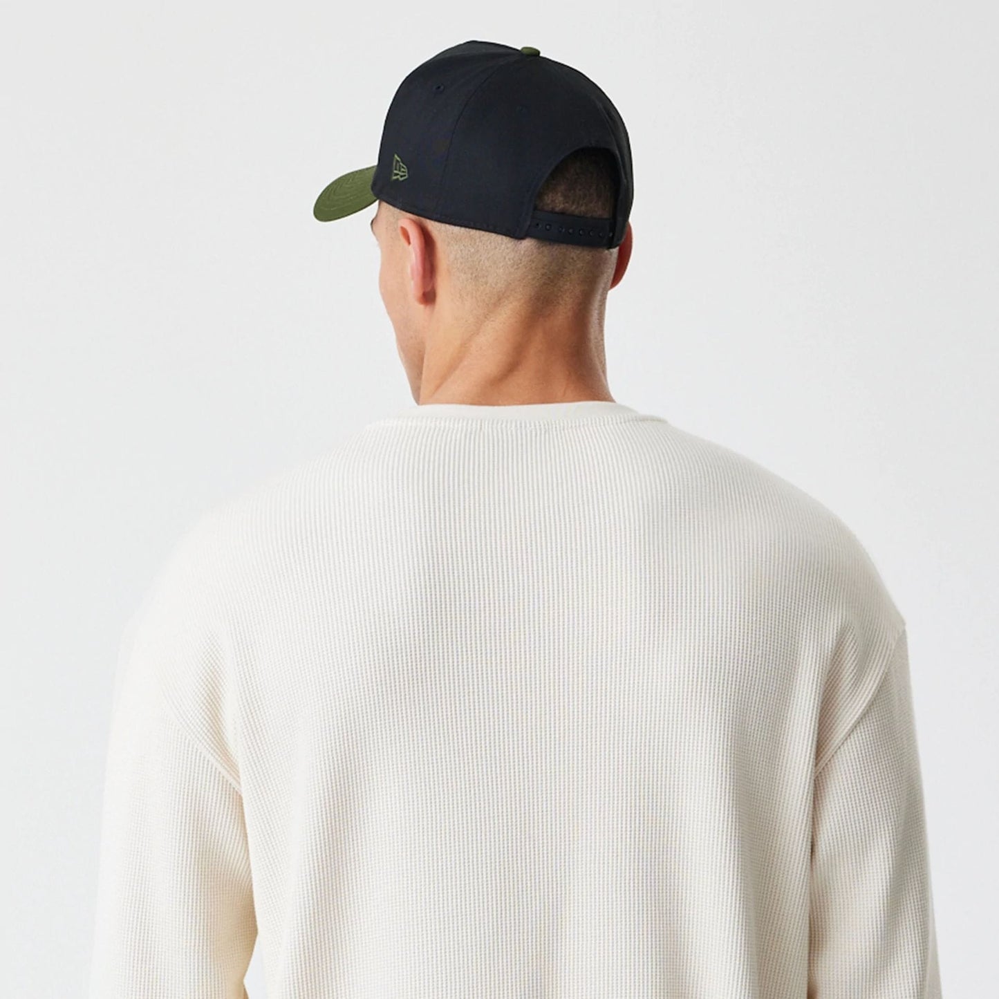 The Male model is wearing New Era Waffle Light Beige Long Sleeve T-Shirt 7
