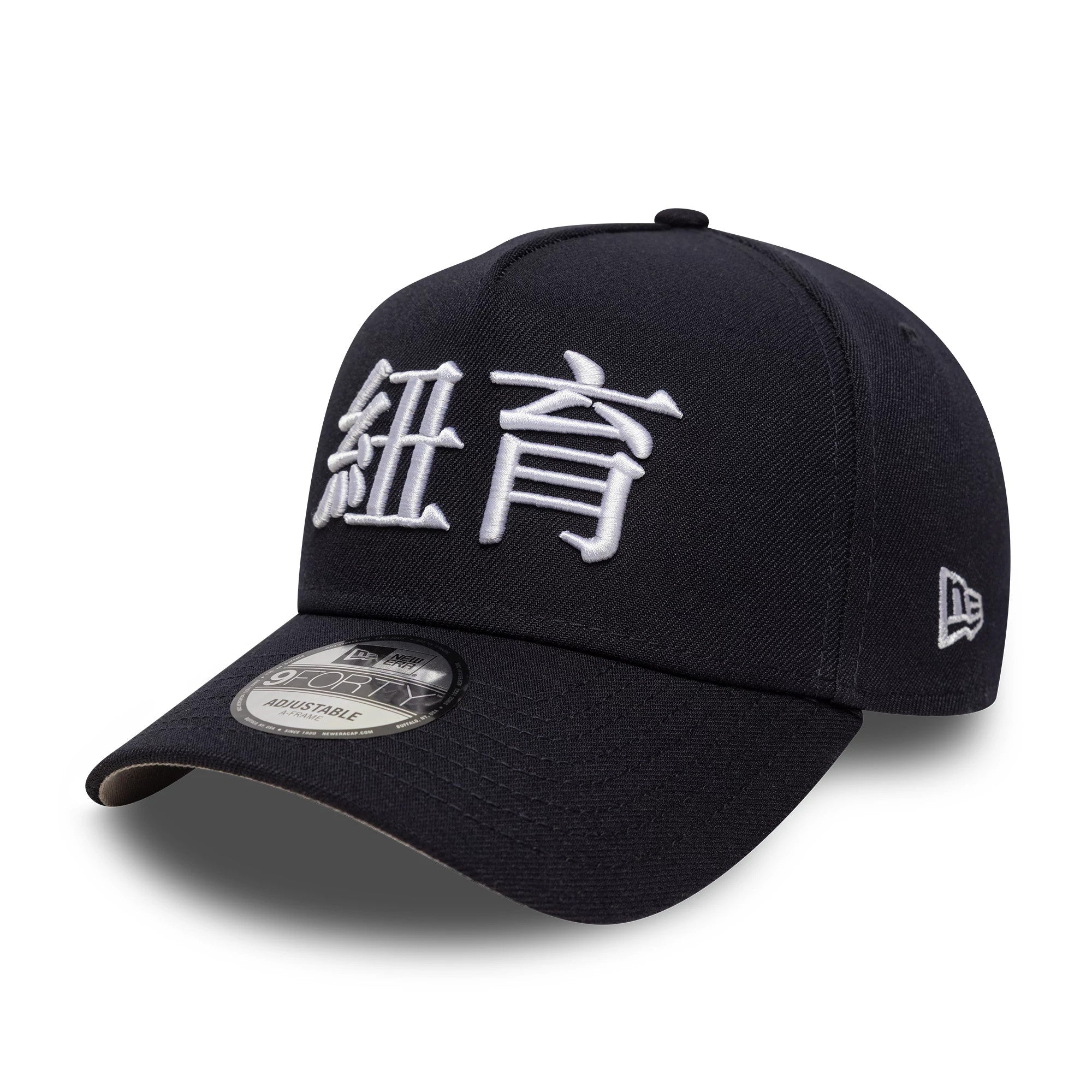 New York Yankees MLB Poly Kanji Navy New Era 9FORTY A-Frame Adjustable Cap, three-quarter view showing the white raised embroidered Kanji lettering on the structured navy crown, with a curved visor and 9FORTY size sticker.