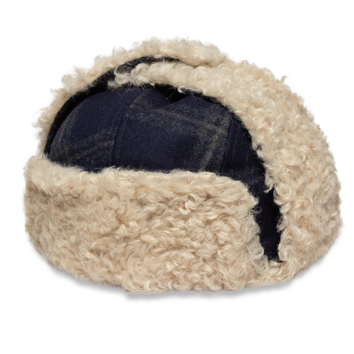 New Era Loden Navy Trapper Hat, rear view showing the navy wool crown partially covered by beige fluffy faux fur lining, with the ear flaps secured upwards on the structured design.
