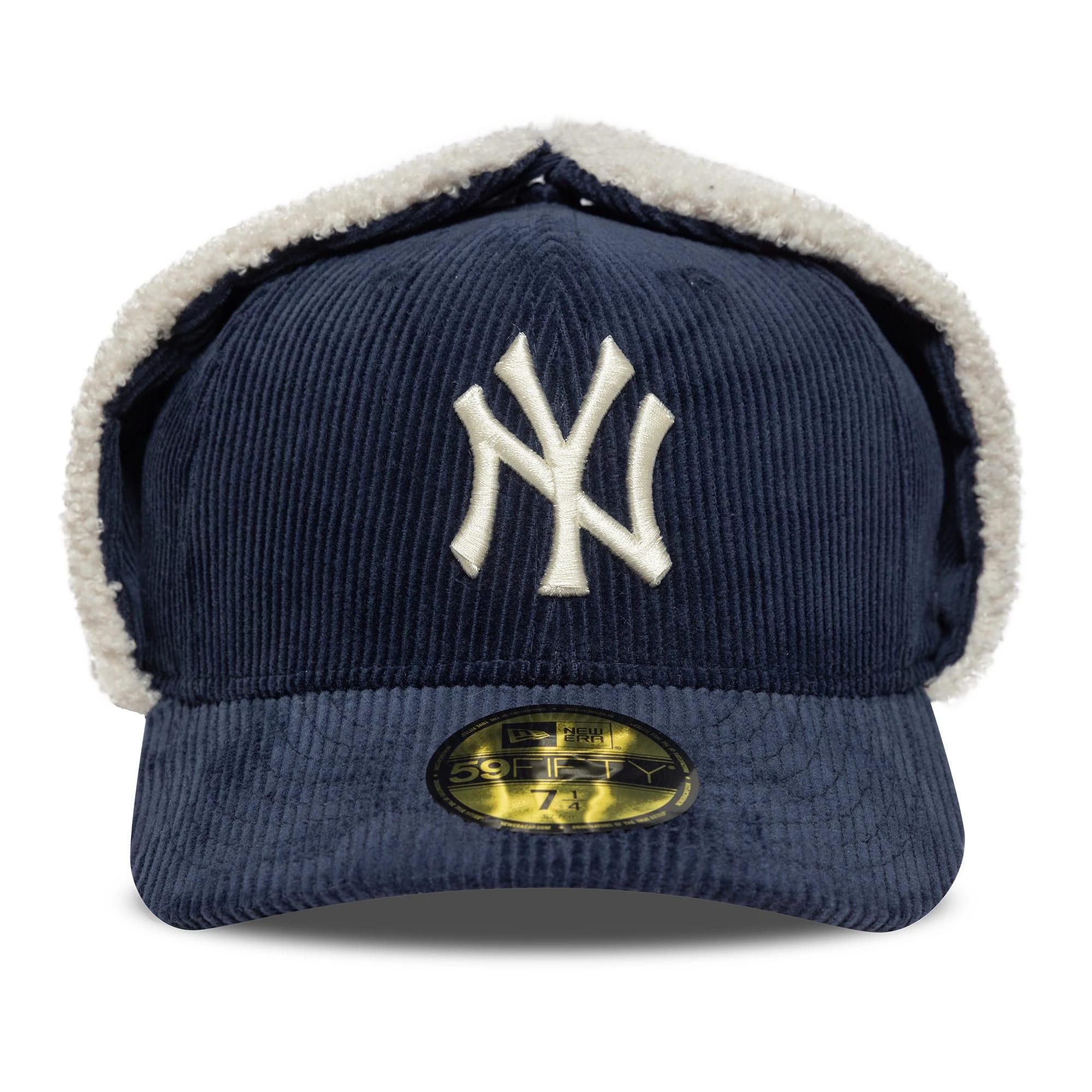 New York Yankees MLB Cord Navy Dogear New Era 59FIFTY Fitted Cap, front view showing the white embroidered NY logo on the structured navy cord crown with cream lining on the dogear flaps, and a gold 59FIFTY size sticker on the flat visor.