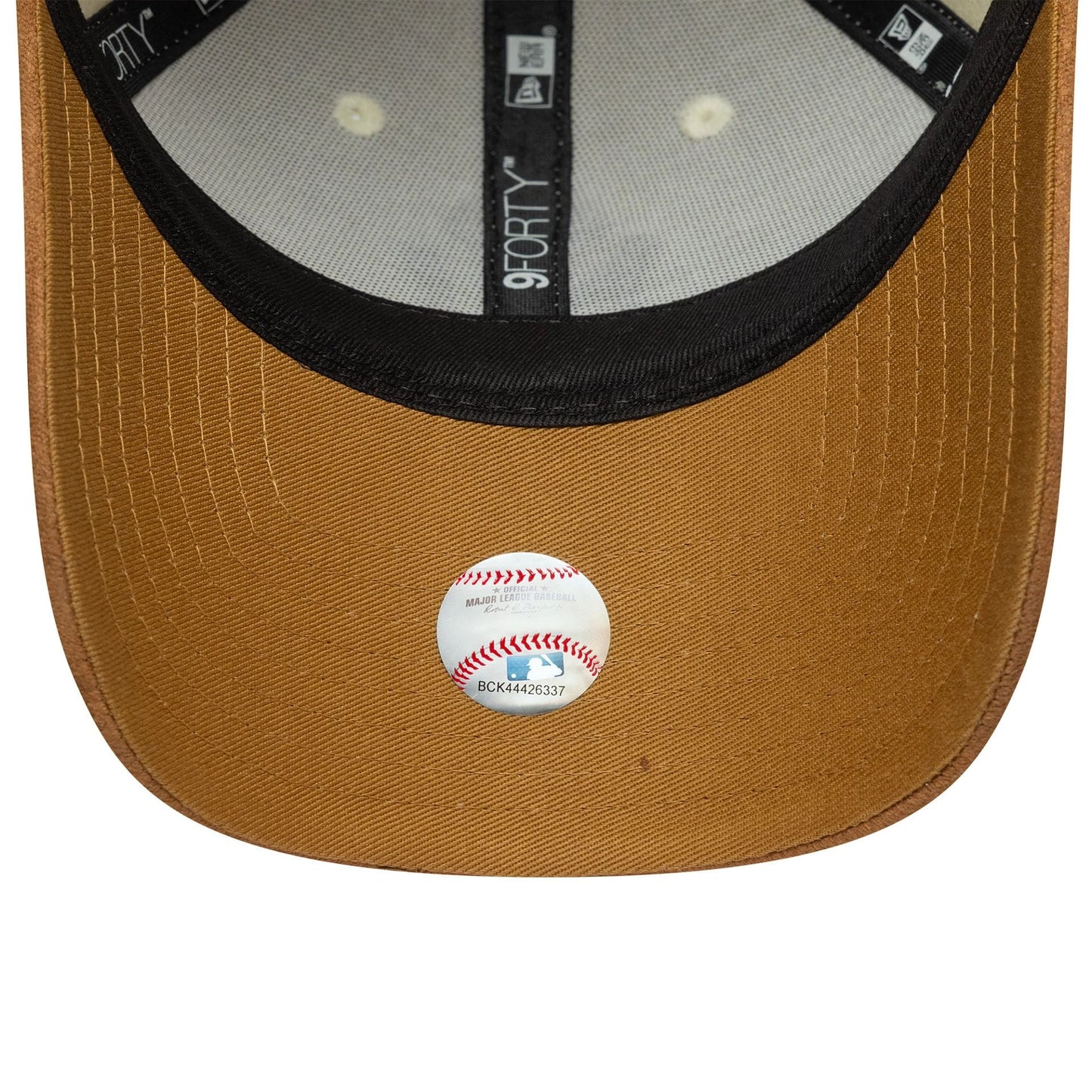 New York Yankees Womens MLB Faux Suede Cream New Era 9FORTY Adjustable Cap, inside view showing grey taping with the 9FORTY logo, a black sweatband, and a grey undervisor featuring an MLB authentication sticker near the front.