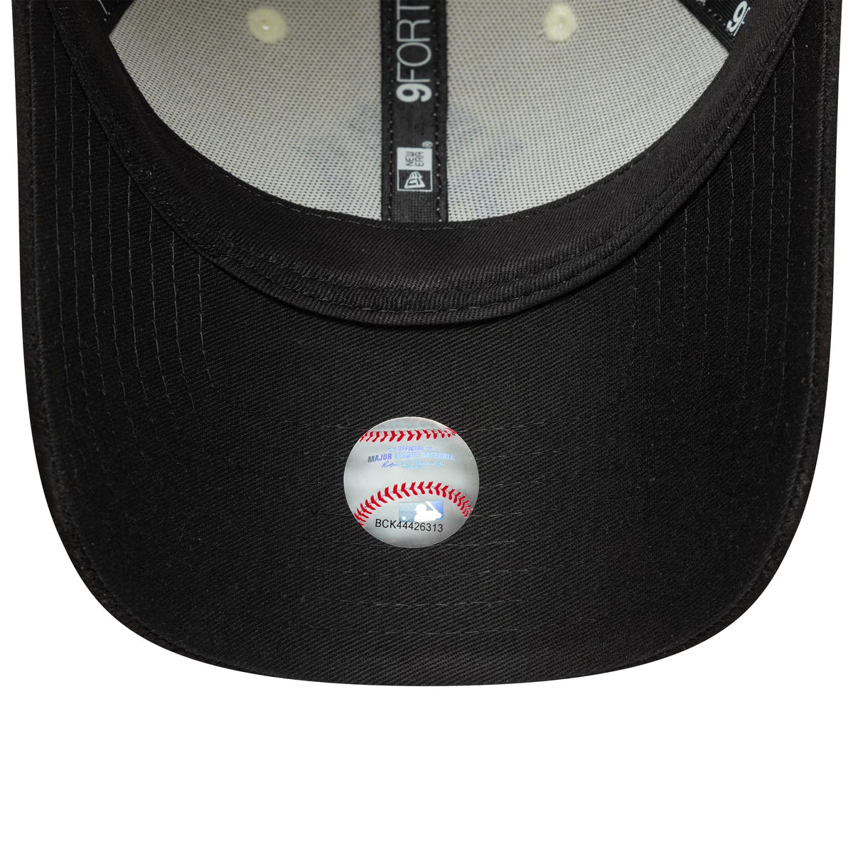 New York Yankees Womens MLB Faux Suede Light Beige New Era 9FORTY Adjustable Cap, inside view featuring the black sweatband, grey taping with 9FORTY logos, and a baseball-themed sticker on the black undervisor.