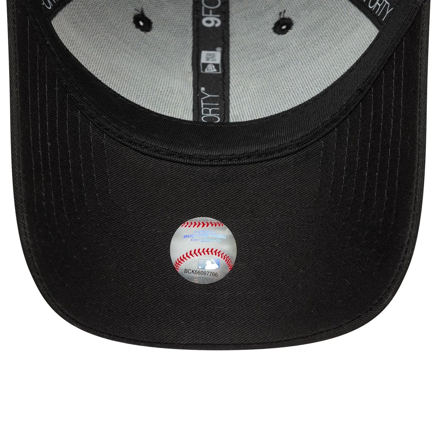 New York Yankees MLB Team Outline Black New Era 9FORTY Adjustable Cap, inside view showing the black sweatband, grey taping with white 9FORTY branding, and a round MLB holographic sticker on the underside of the black curved visor.