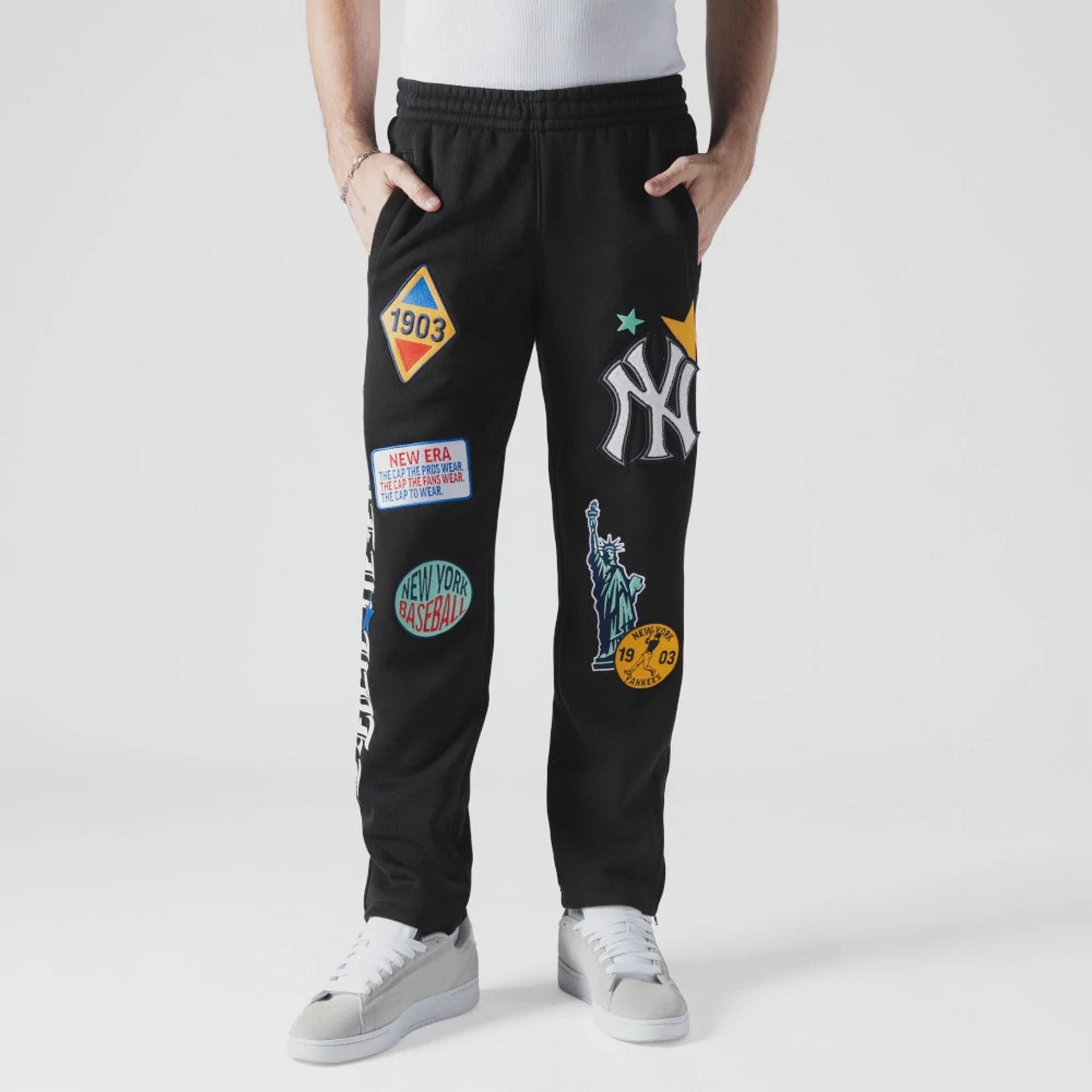 The Male model is wearing New York Yankees MLB x Uptown Threads Black Joggers 1