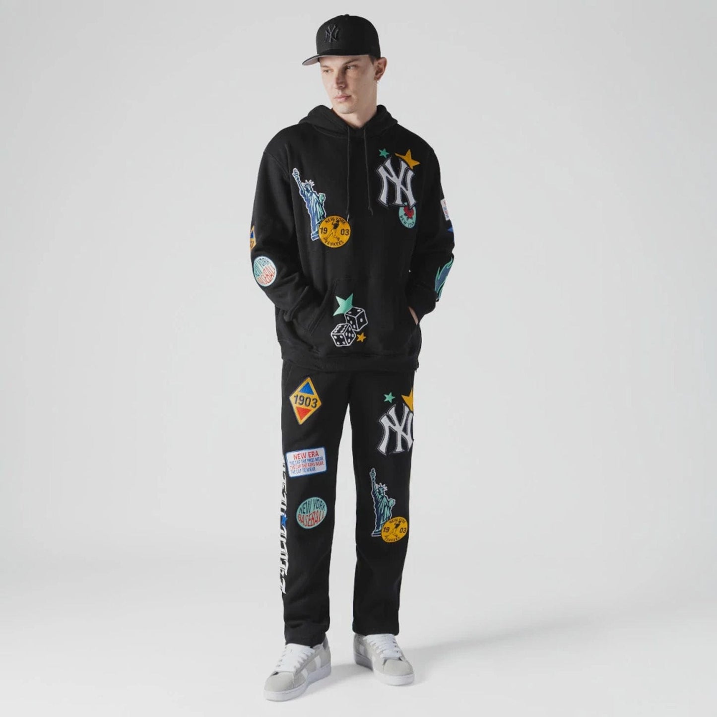 The Male model is wearing New York Yankees MLB x Uptown Threads Black Joggers 4