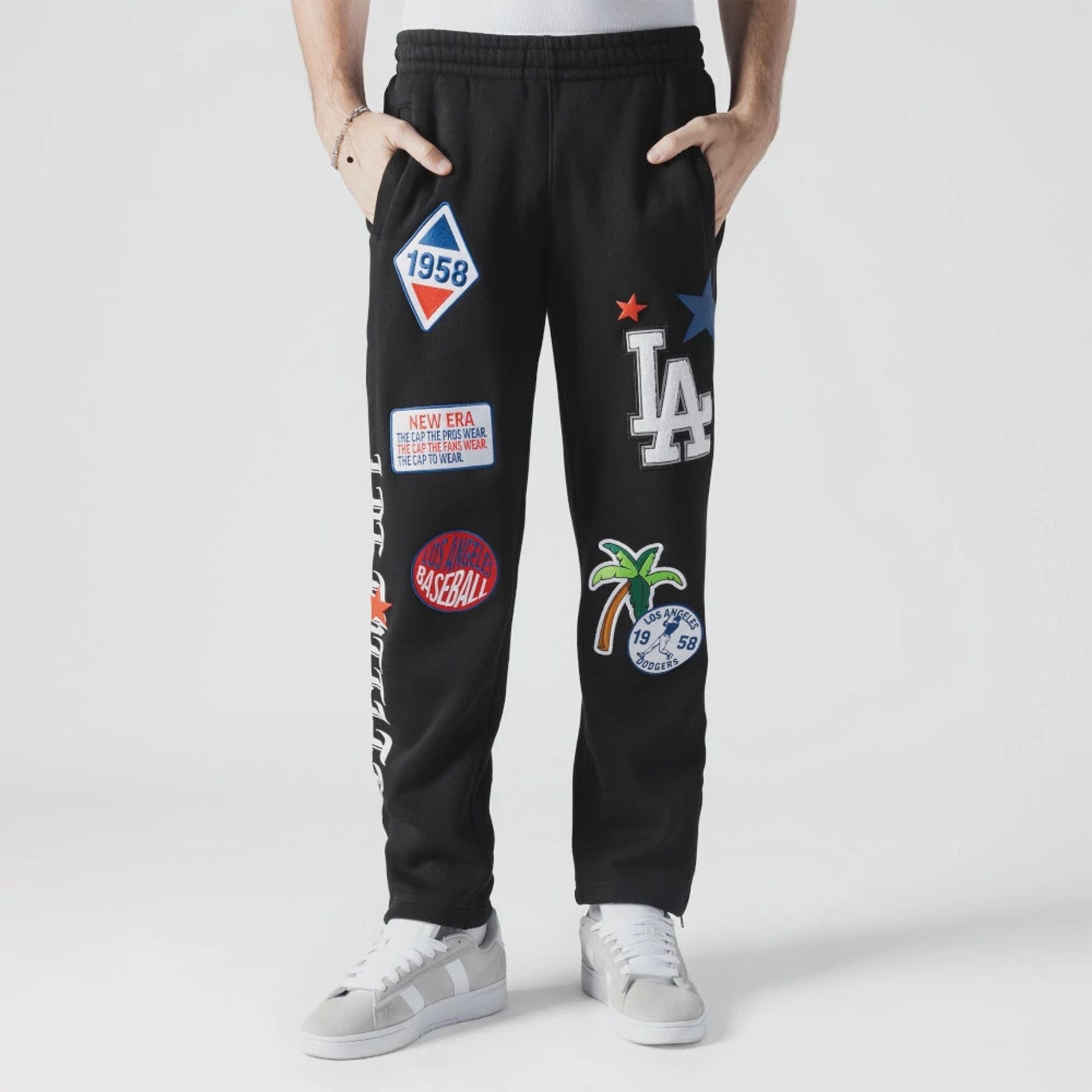The Male model is wearing LA Dodgers MLB x Uptown Threads Black Joggers 1