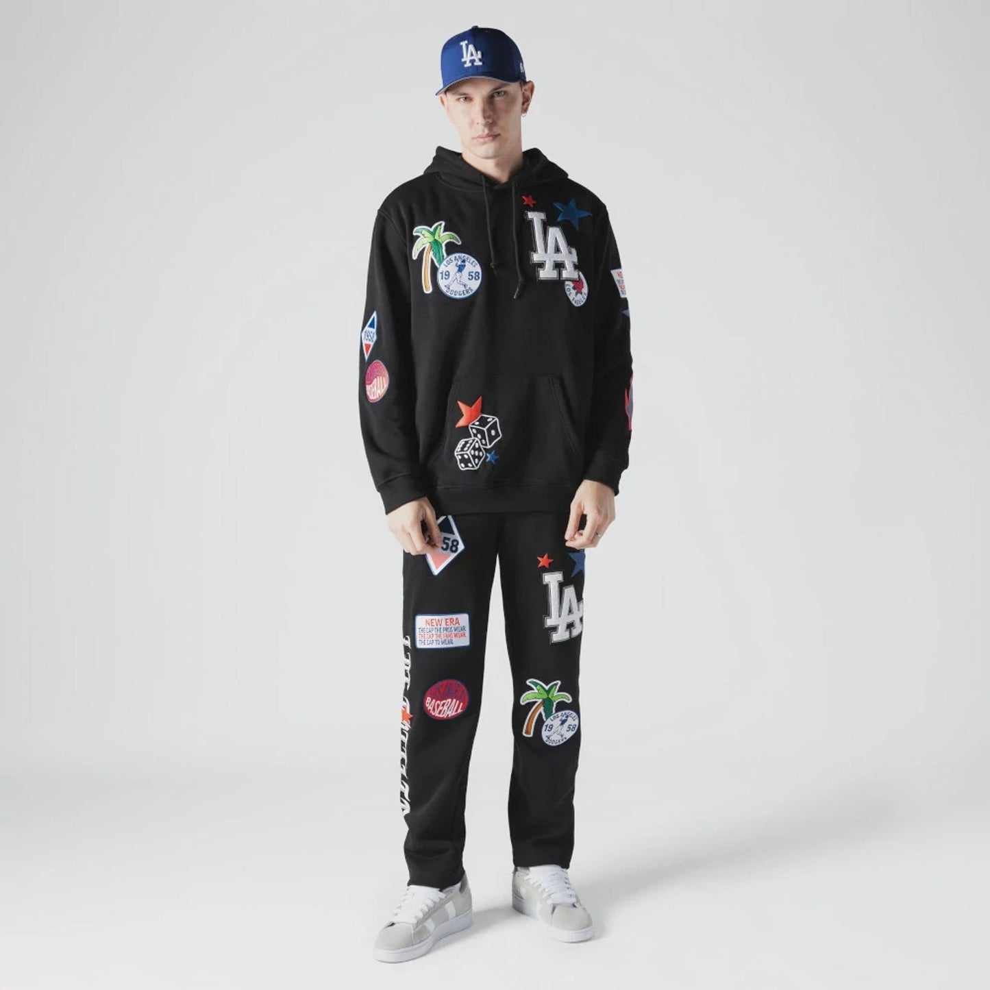 The Male model is wearing LA Dodgers MLB x Uptown Threads Black Joggers 4