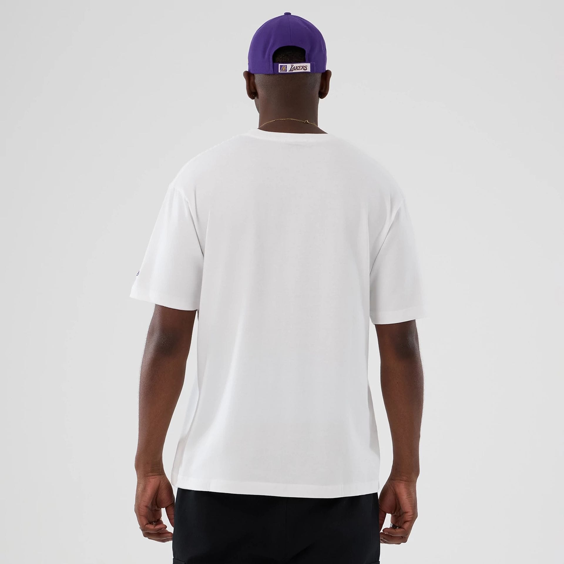 The Male model is wearing LA Lakers NBA Lifestyle Graphic White T-Shirt 2