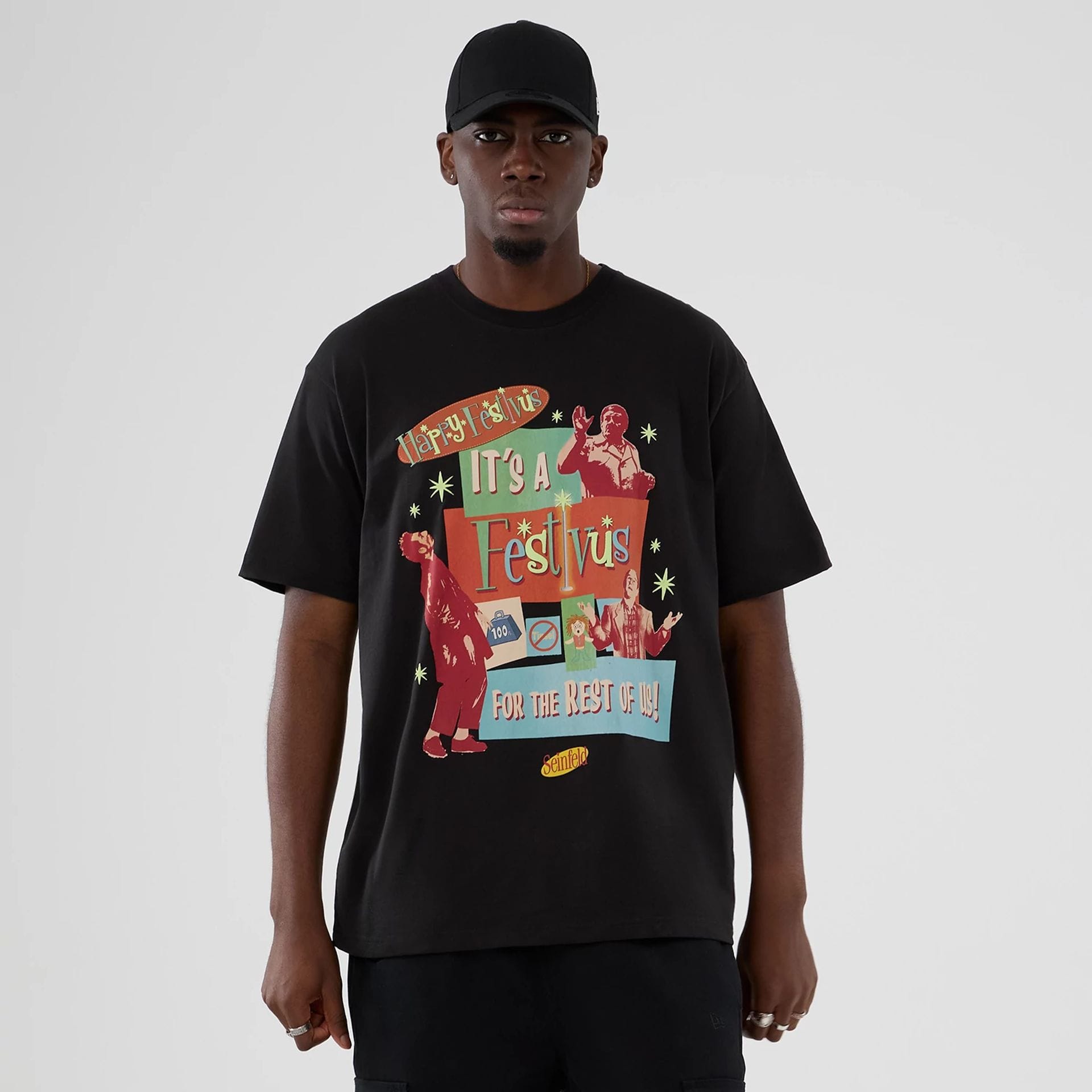 The Male model is wearing Seinfeld Lifestyle Graphic Black T-Shirt 1
