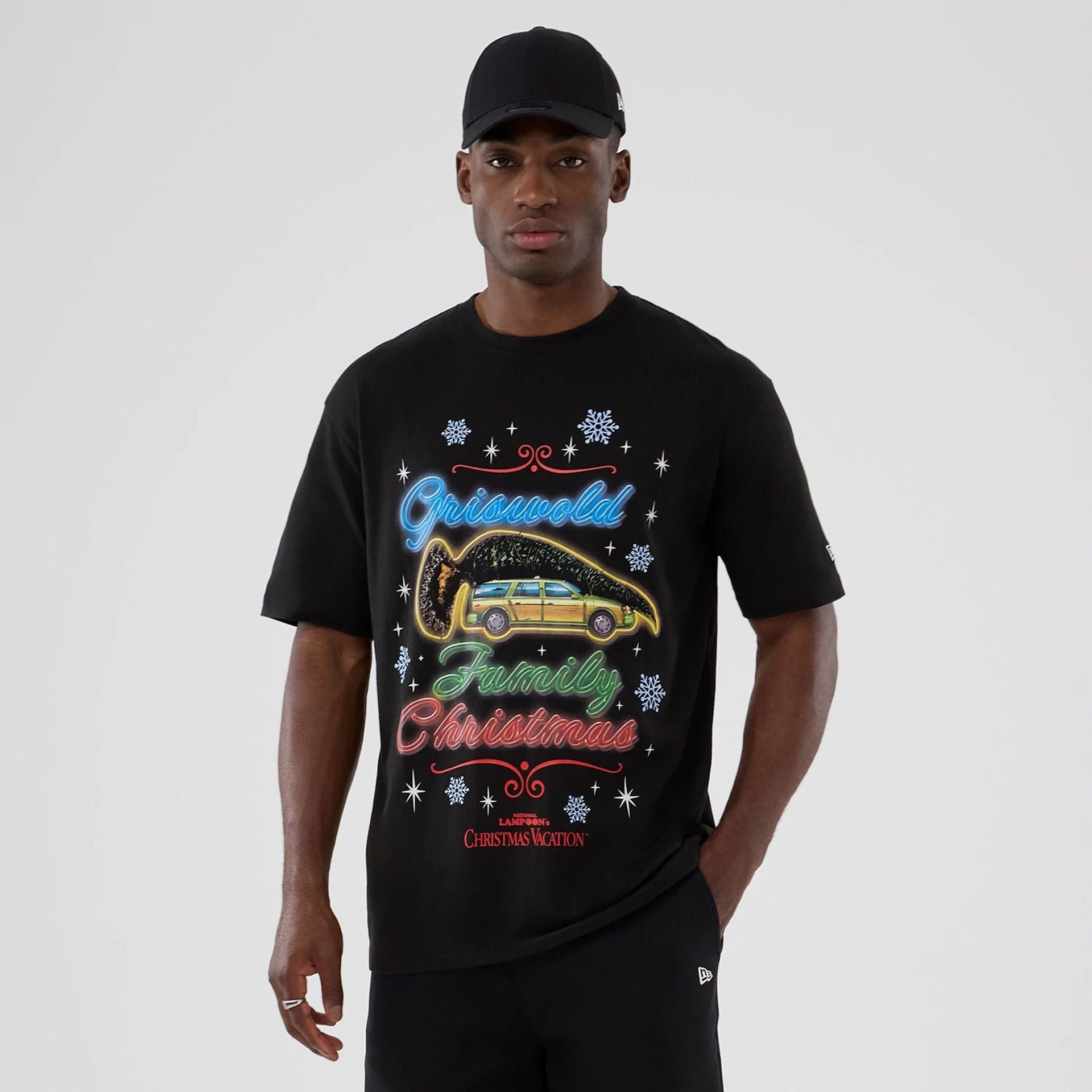 The Male model is wearing National Lampoon's Christmas Vacation Lifestyle Graphic Black T-Shirt 1