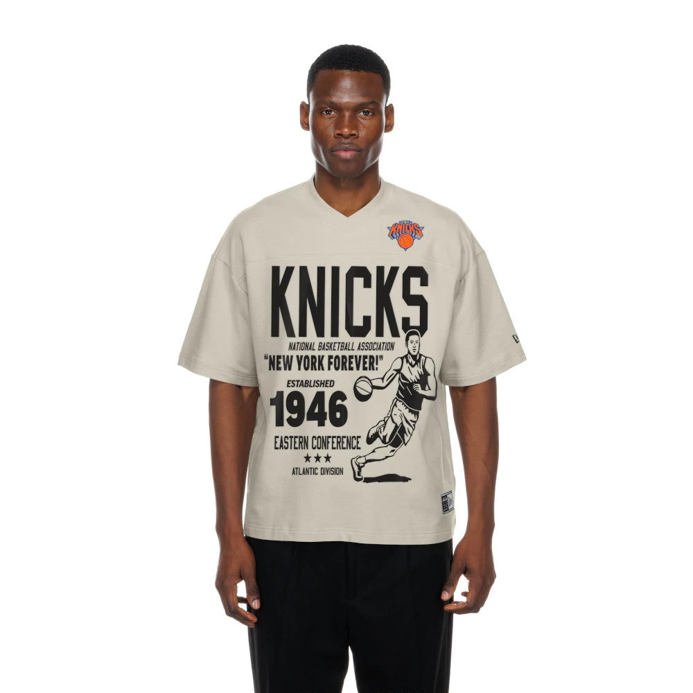 The Male model is wearing New York Knicks NBA Throwback Prep Light Beige T-Shirt 1