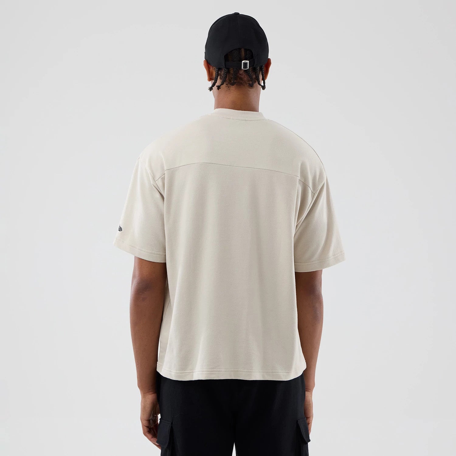 The Male model is wearing New York Giants NFL Throwback Prep Light Beige T-Shirt 2