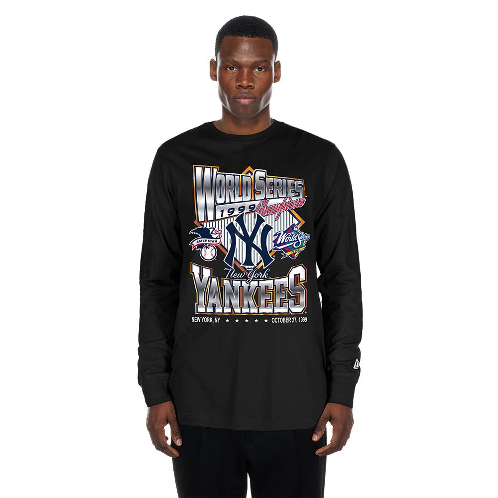 New Era New York Yankees MLB Sport Classic Black Long Sleeve T-Shirt, front view showing 1999 World Series graphics centred on the chest with two team logos, YANKEES text below, worn by a model with plain black trousers.