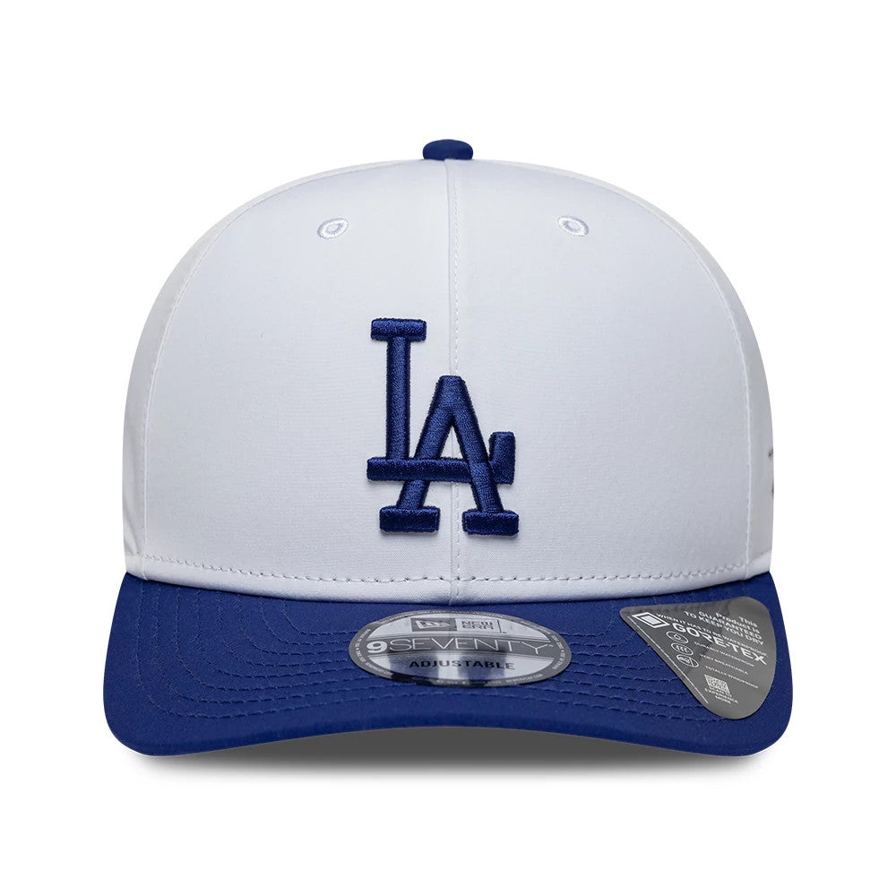 LA Dodgers MLB Gore-Tex White New Era 9SEVENTY Stretch Snap Adjustable Cap, front view showing the raised blue LA logo embroidered on the white crown, with a blue visor and a 9SEVENTY size sticker.