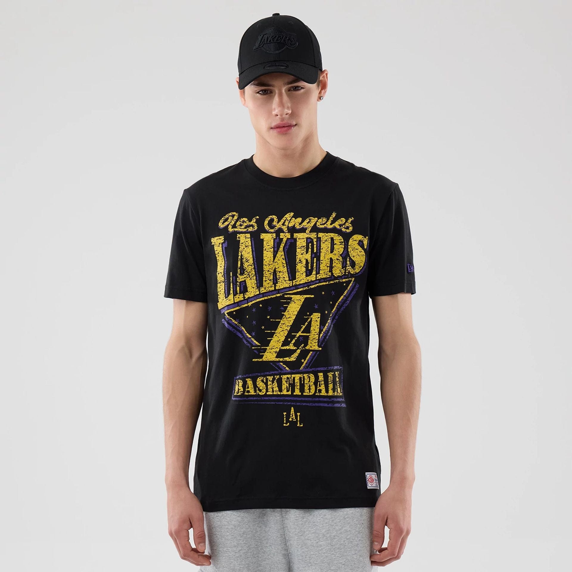 The Male model is wearing LA Lakers NBA City Edition Black T-Shirt 1