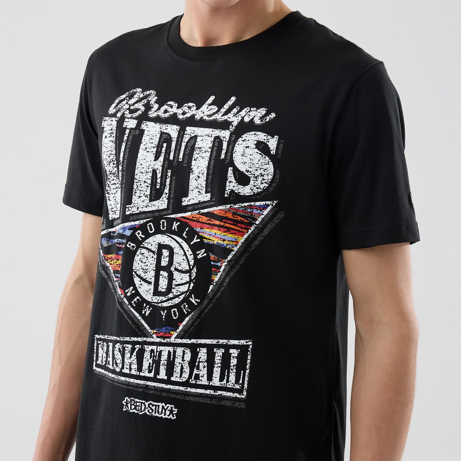 The Male model is wearing Brooklyn Nets NBA City Edition Black T-Shirt 3