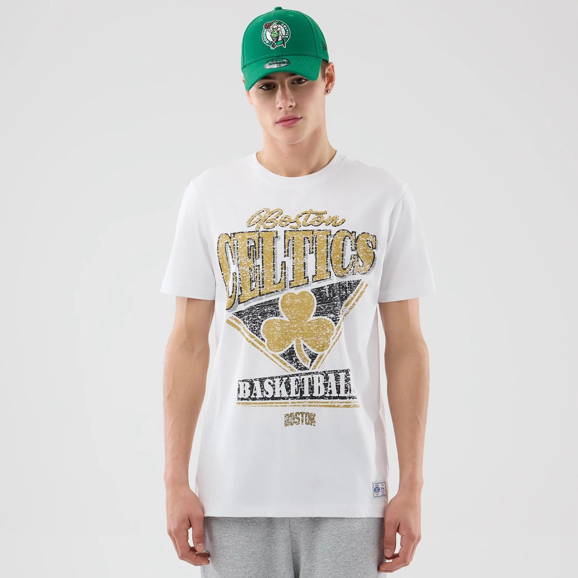 The Male model is wearing Boston Celtics NBA City Edition White T-Shirt 1