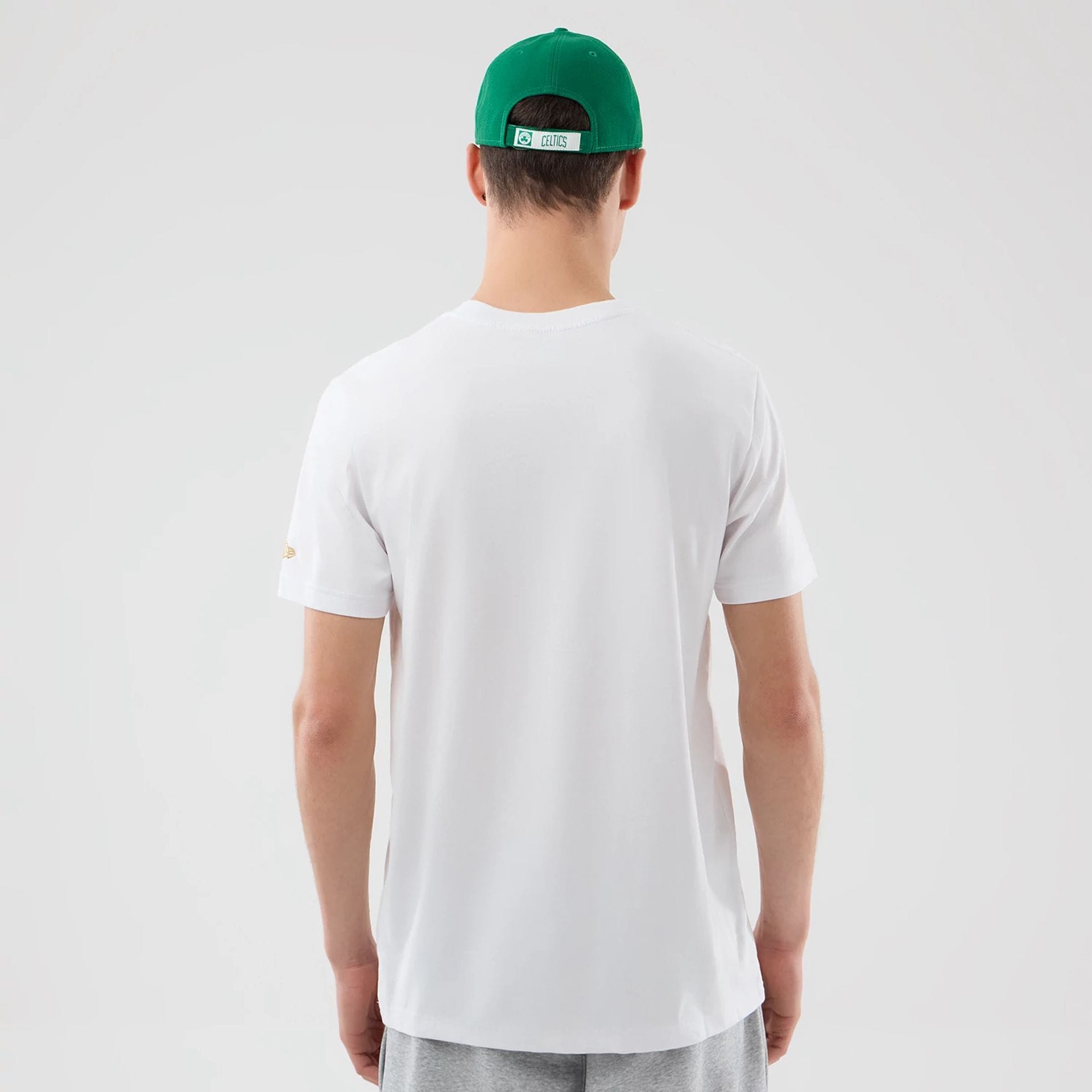The Male model is wearing Boston Celtics NBA City Edition White T-Shirt 2