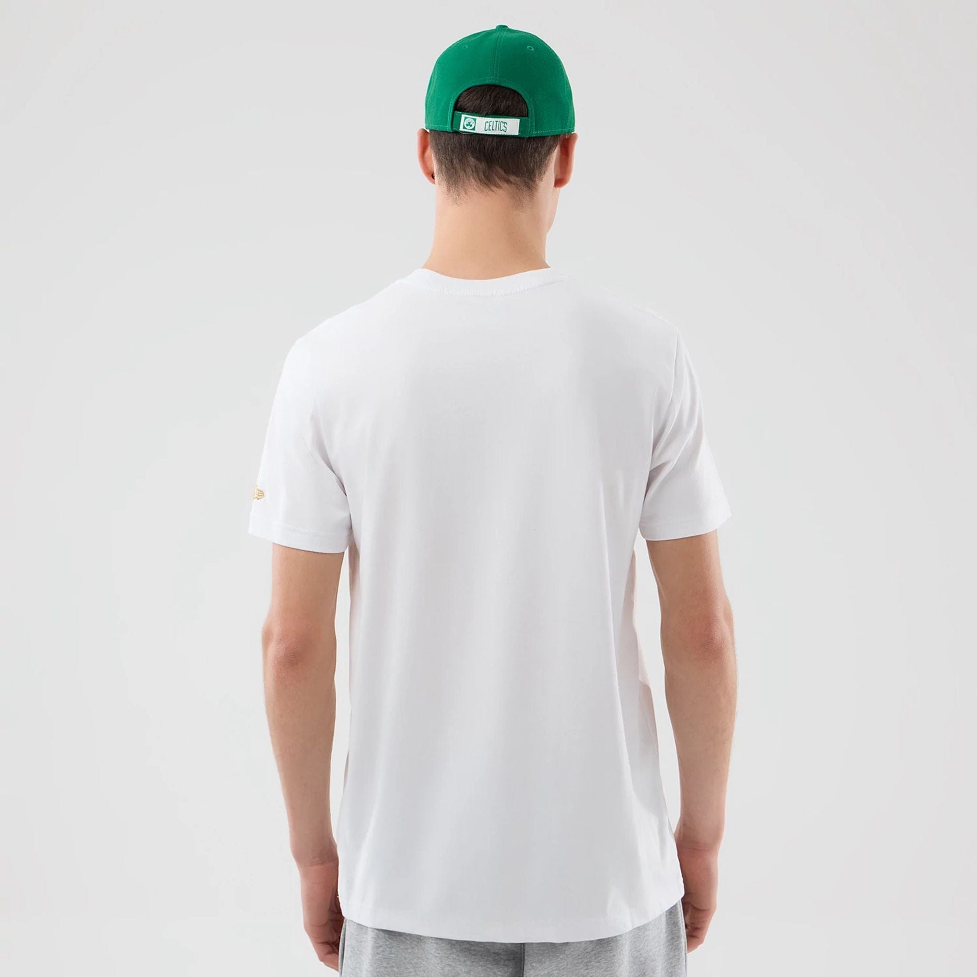 The Male model is wearing Boston Celtics NBA City Edition White T-Shirt 2