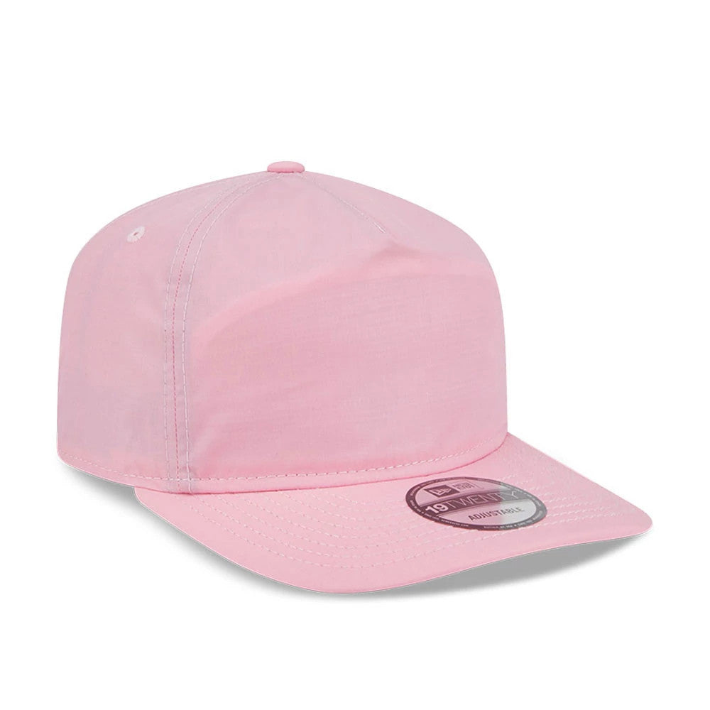 New Era Open Pink 19TWENTY Adjustable Cap, three-quarter view showing the pink unstructured crown with pink top button, curved pink visor, and a purple 19TWENTY size sticker on the visor.