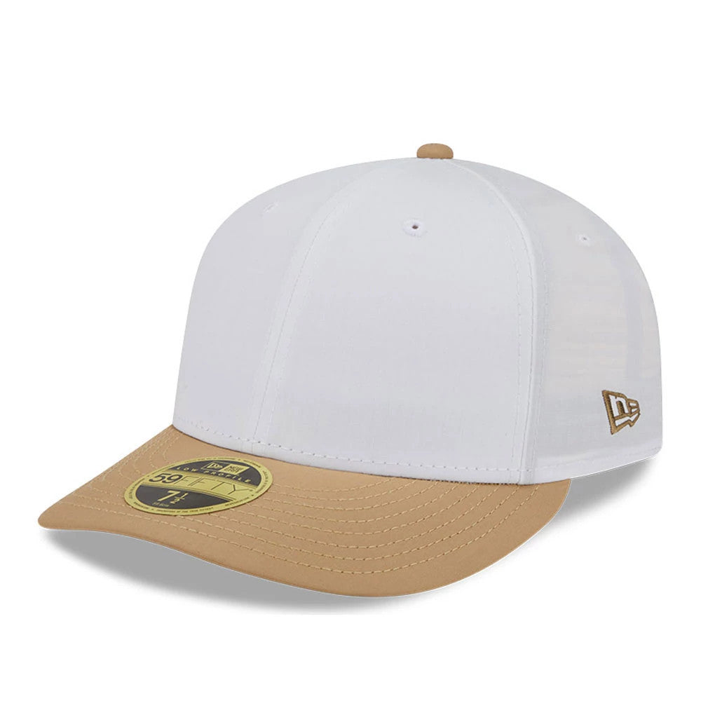 New Era Open White & Beige Low Profile 59FIFTY Fitted Cap, three-quarter view showing the gold 59FIFTY size sticker on the beige curved visor, with a white embroidered New Era flag logo on the left side and a beige top button.