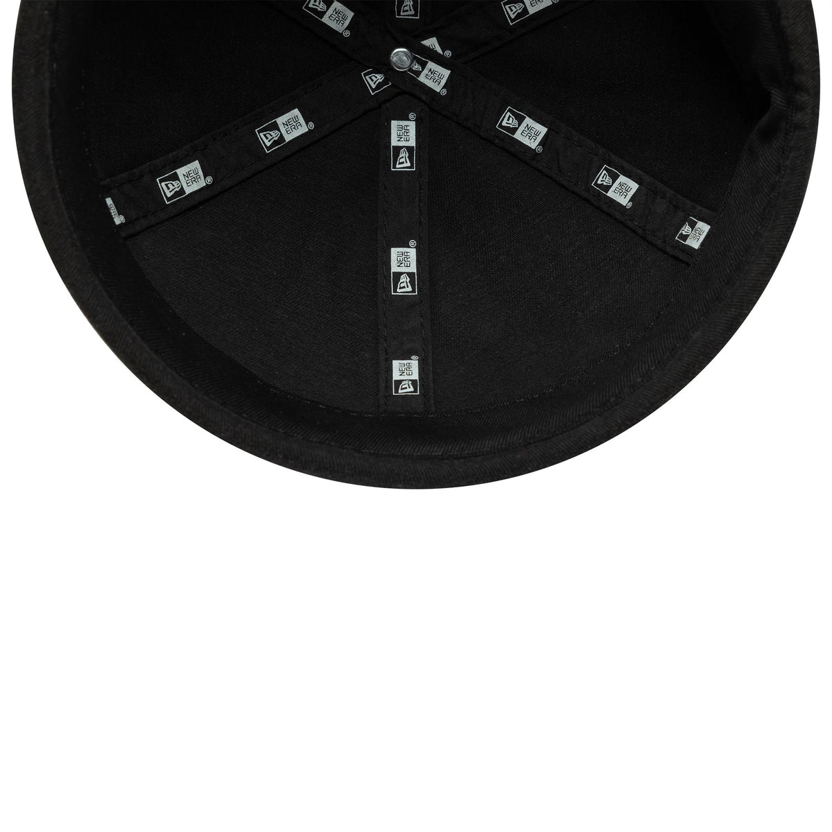 New Era Washed Cotton Black Docker Adjustable Hat, inside view showing the black fabric with New Era branded taping along the seams and a silver top button, highlighting the structured inner construction.