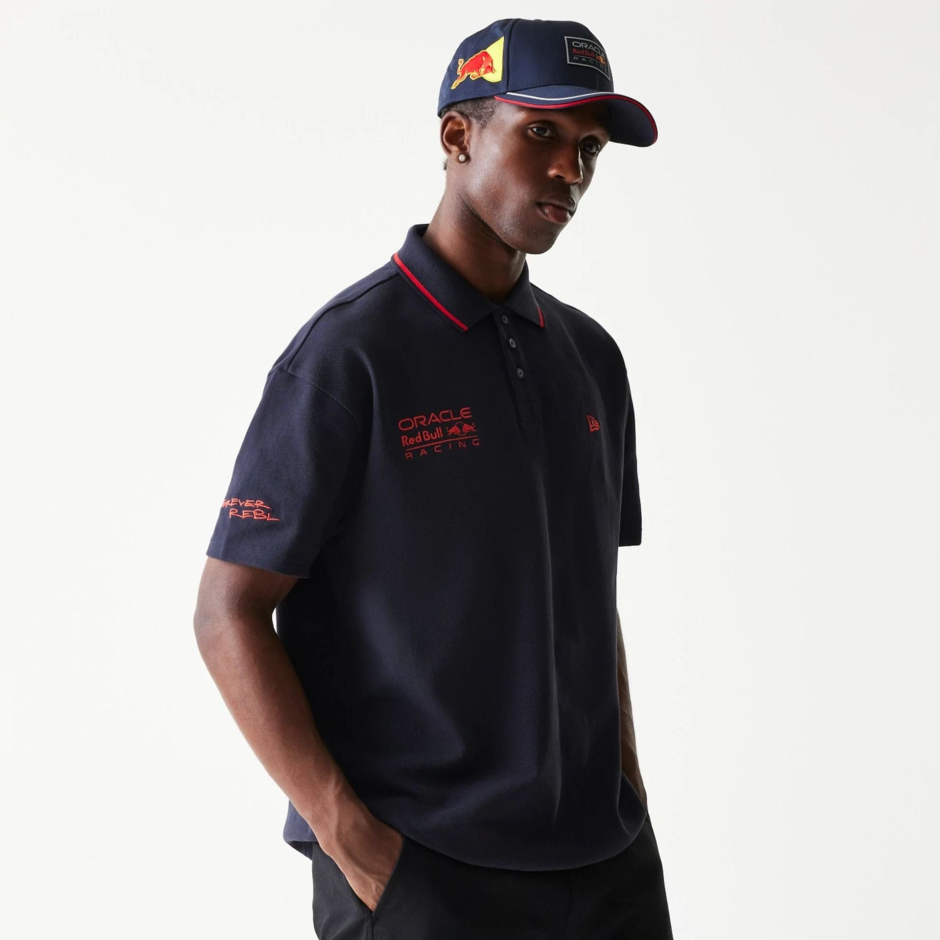 The Male model is wearing Red Bull Racing Dark Blue Polo T-Shirt 1
