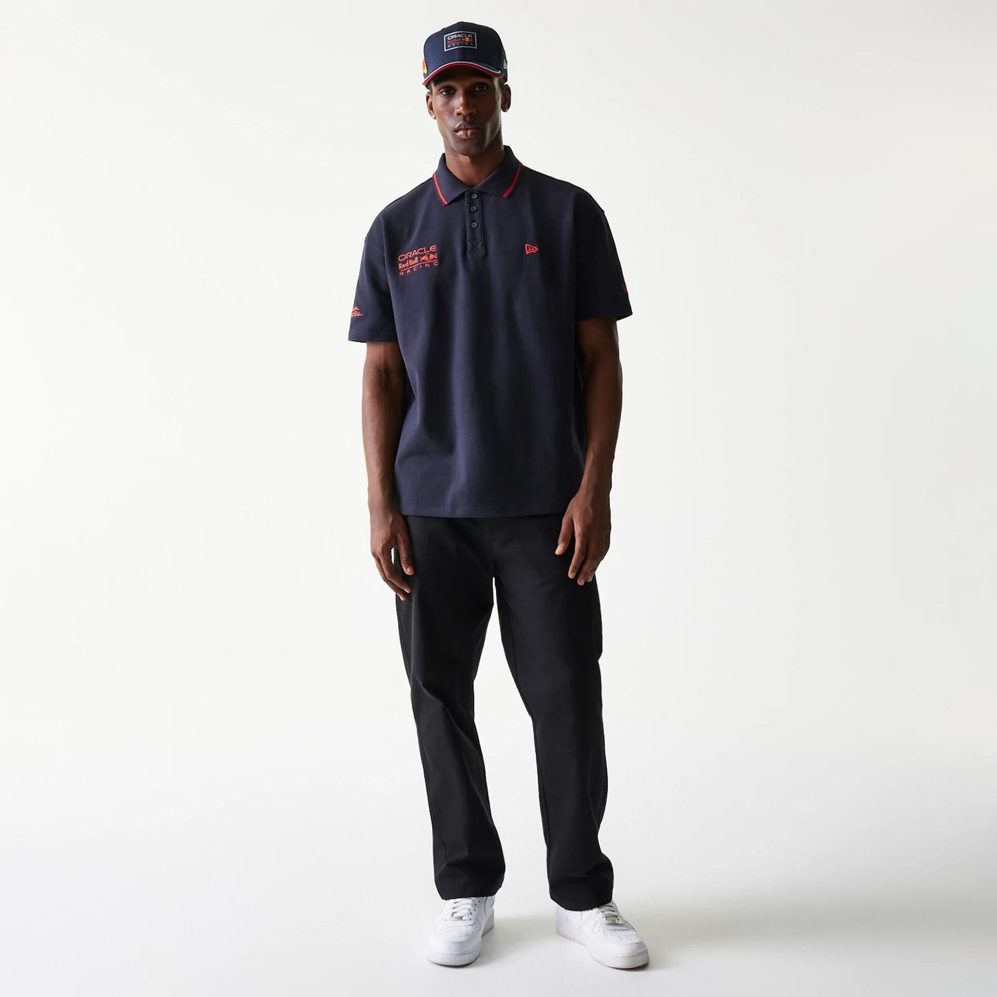 The Male model is wearing Red Bull Racing Dark Blue Polo T-Shirt 8