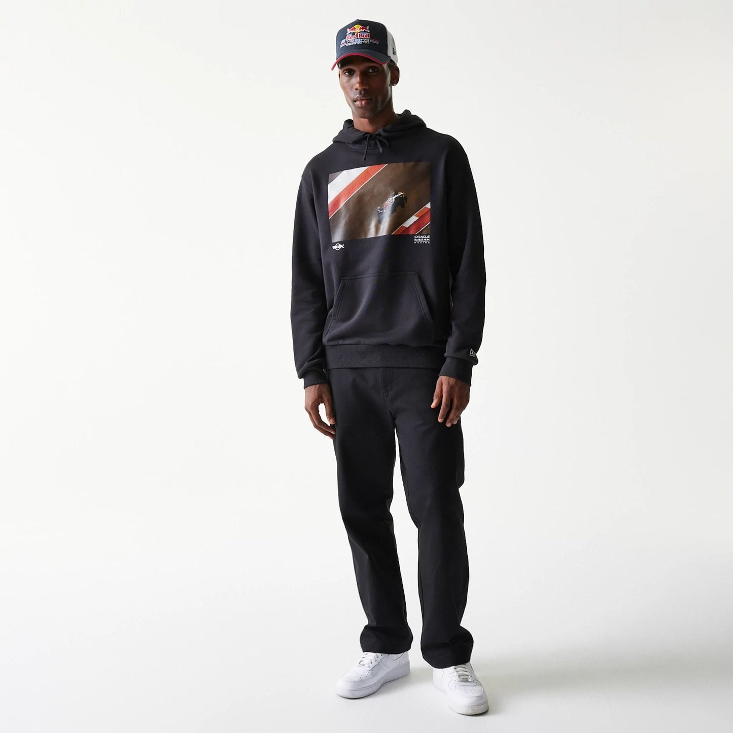 The Male model is wearing Red Bull Racing Black Oversized Pullover Hoodie 8