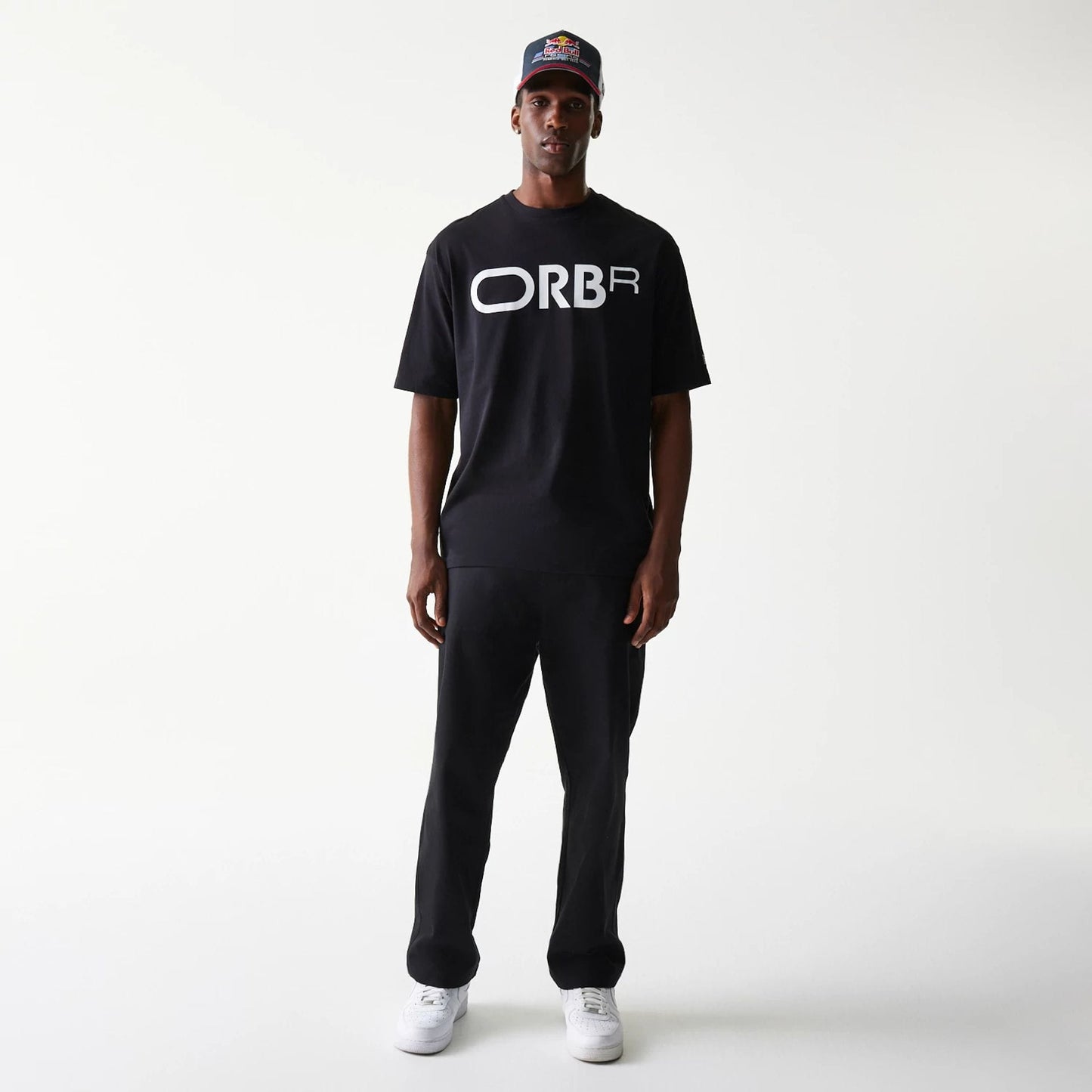 The Male model is wearing Red Bull Racing Profile Black Oversized T-Shirt 8